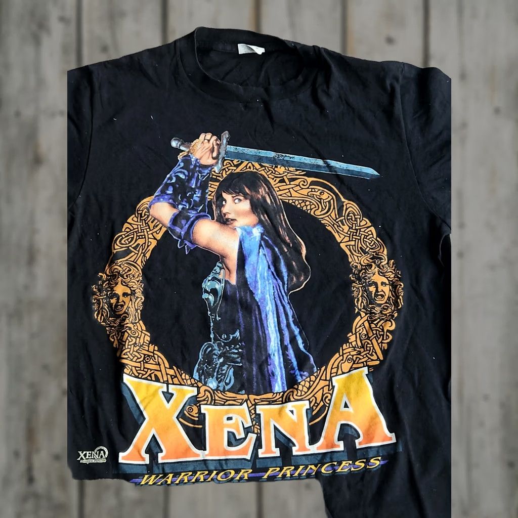 Vintage VINTAGE 1996 Xena Warrior Princess T-Shirt L Men Black 53 Chest 78 Length Rare Excellent Shape Size US L / EU 52-54 / 3 - 1 Thumbnail