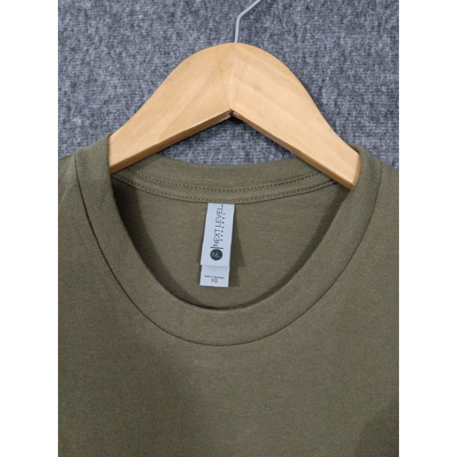 Next Level Next Level Crew Neck T-Shirt XS Olive Unisex Size XS Color Green 2-Pack Solid Short Sleeve 60% Cotton 40% Polyester Jersey Nike Shirt Size US XS / EU 42 / 0 - 3 Thumbnail