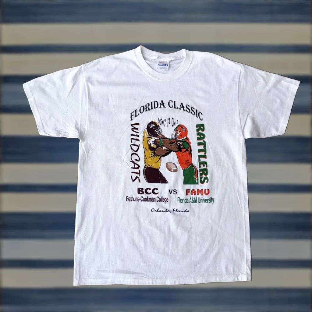 Hanes VINTAGE Florida Classic FAMU Vs Bethune Cookman NCAA Football T-Shirt Large White Hanes Men Short Sleeve Crew Neck Cotton Graphic Print Double-Sided Size US L / EU 52-54 / 3 - 1 Thumbnail