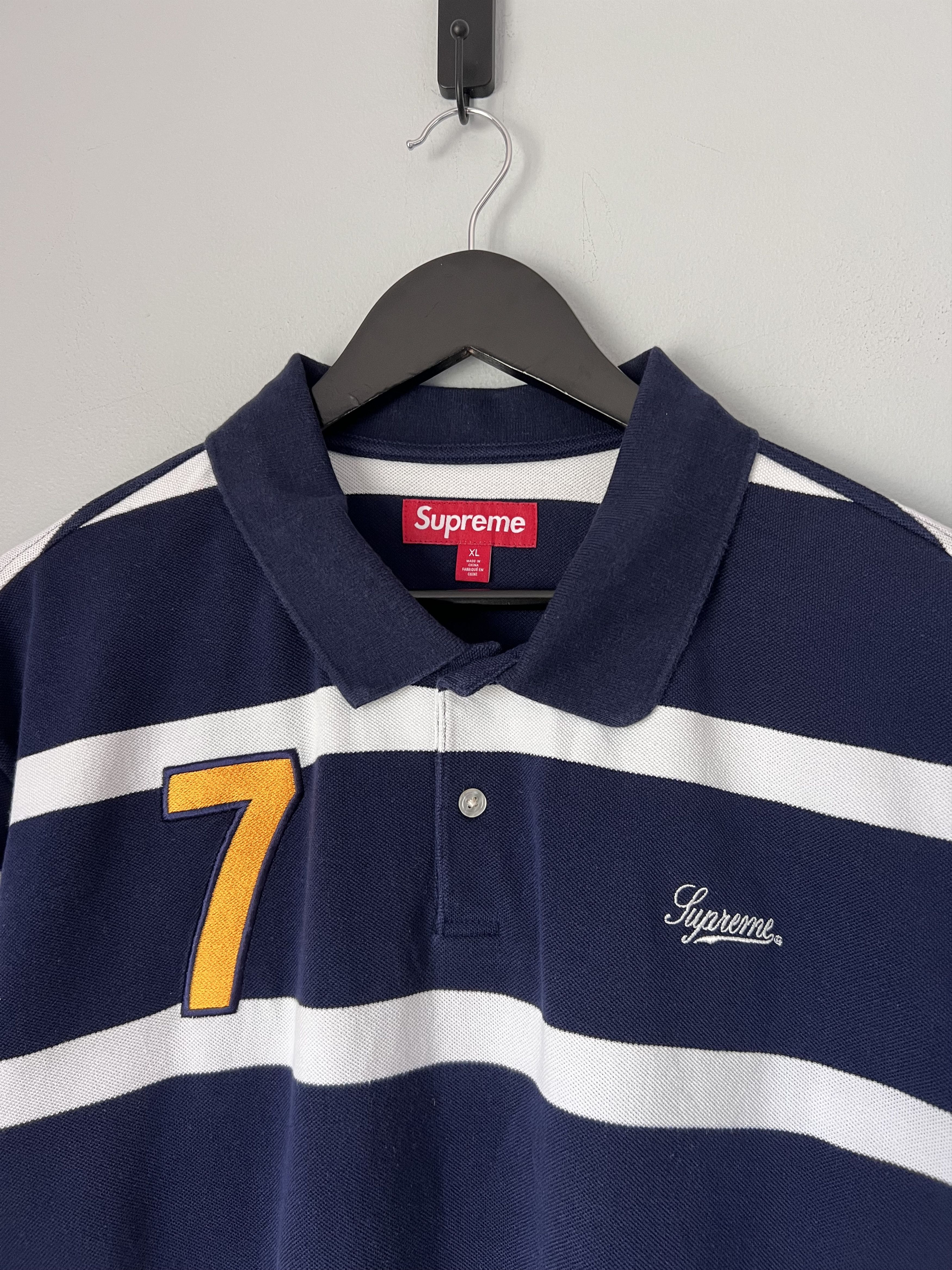 Supreme Cursive Polo in Navy Stripe