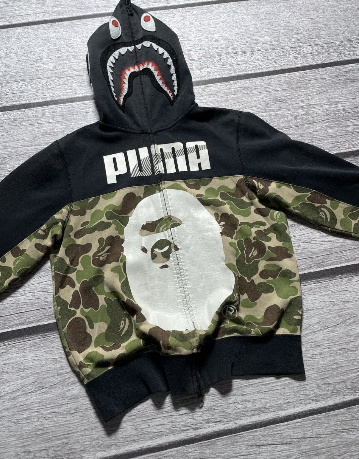 Bape × Puma Bape x Puma collab black and green camo hoodie | Grailed
