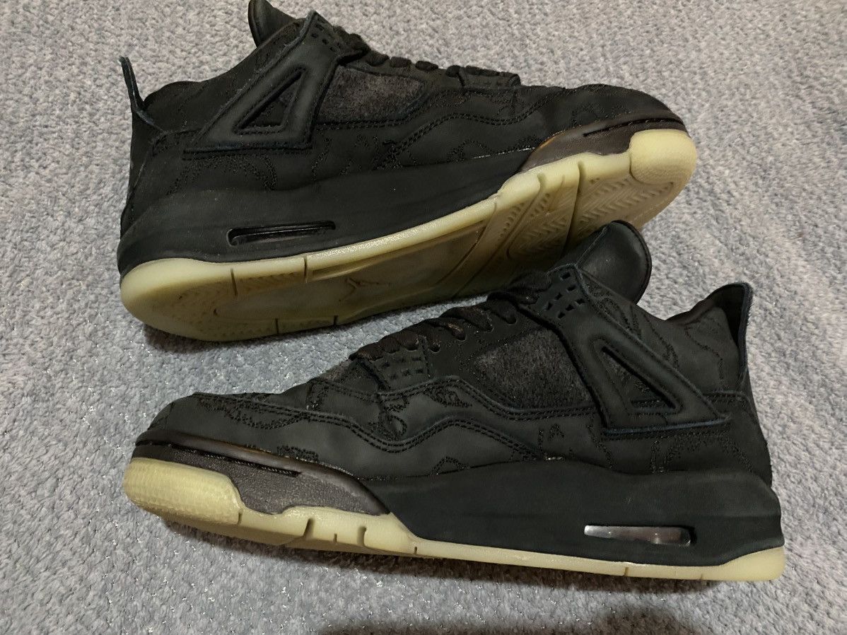 Jordan Brand × Kaws Nike Air Jordan 4 x Kaws "Black" Size US 7 / EU 40 - 2 Thumbnail