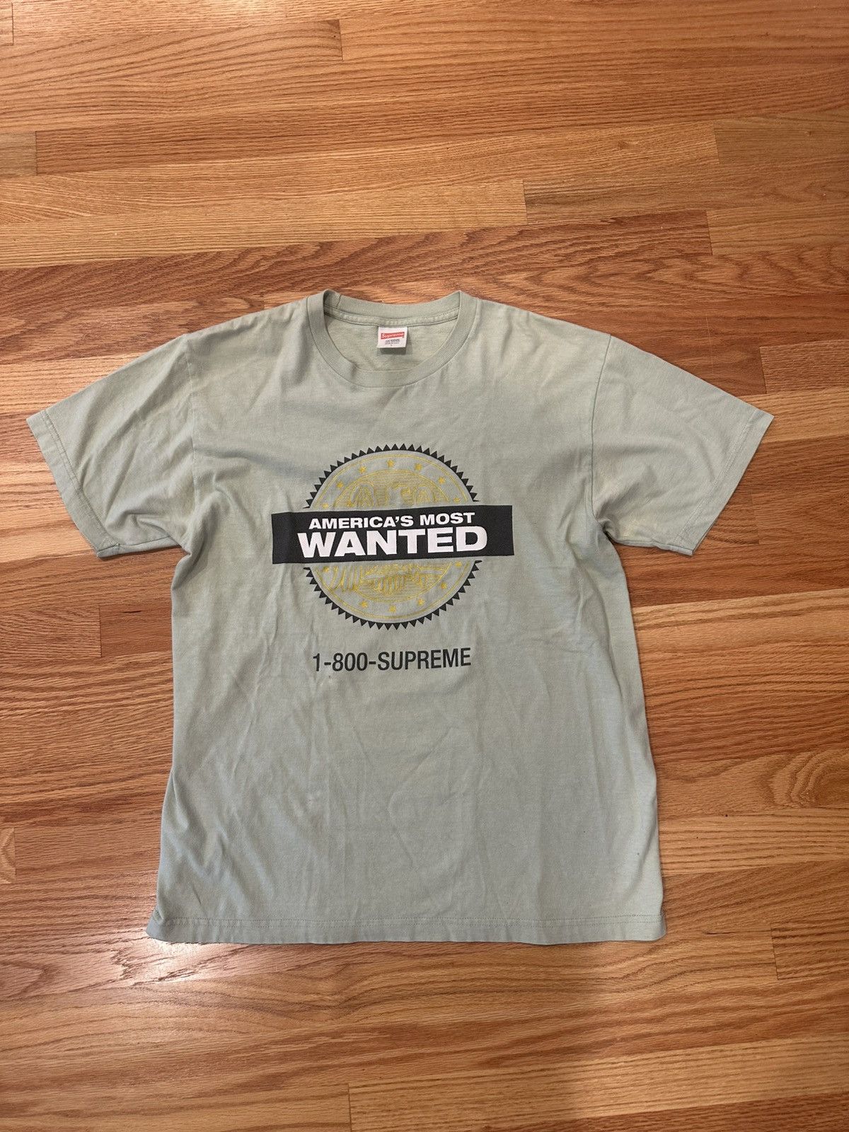 Supreme シュプリーム AMERICA'S MOST WANTED XL Supreme Supreme America's Most Wanted T Shirt in Mint | Grailed