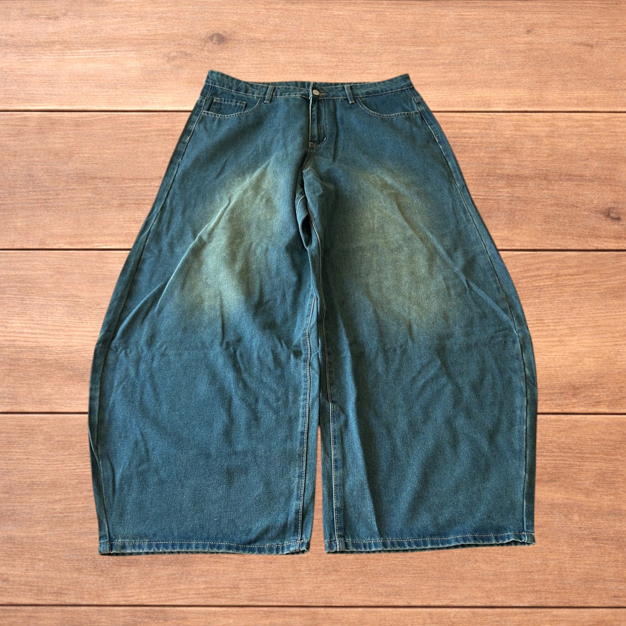 Vintage style baggy wide leg skater jeans with fade in blue.