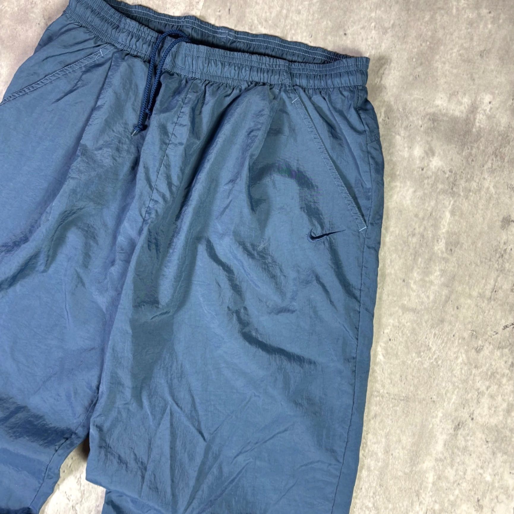 Nike VINTAGE Nike Windbreaker Track Pants Navy Blue L Unisex Adults Nike Swingman Taffeta Water Resistant Windproof Elastic Drawstring Inseam 29 in stb Size US 33 - 7 Thumbnail