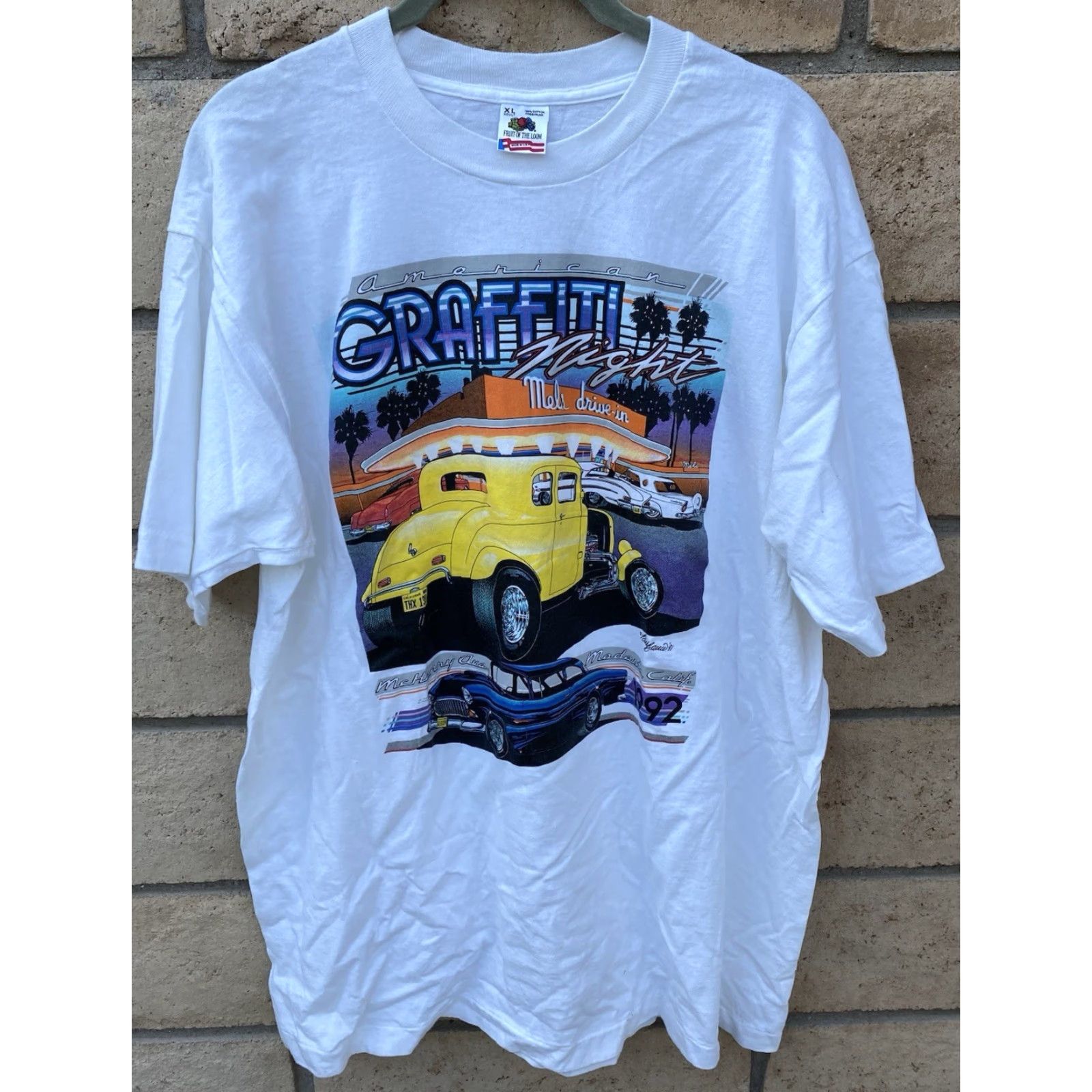 Fruit Of The Loom VINTAGE American Graffiti Night Mels Deive In Modesto 1992 T-Shirt Tee XL White USA 90s Cars City Thread: Fruit of the Loom Men T-Shirt Size US XL / EU 56 / 4 - 2 Thumbnail