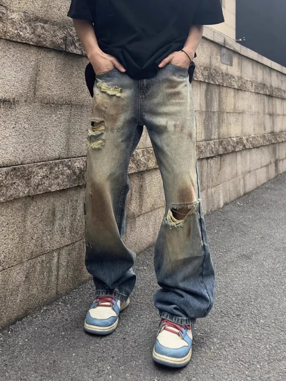 Retro loose fitting straight leg distressed jeans