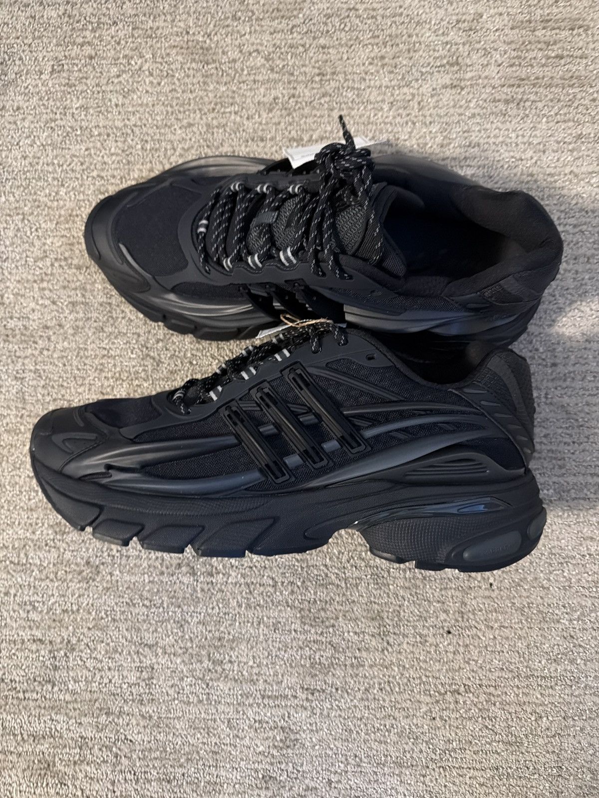 Adidas × Pharrell ADIDAS JELLYFISH TRIPLE BLACK Size US 15 / EU 48 - 1 Thumbnail