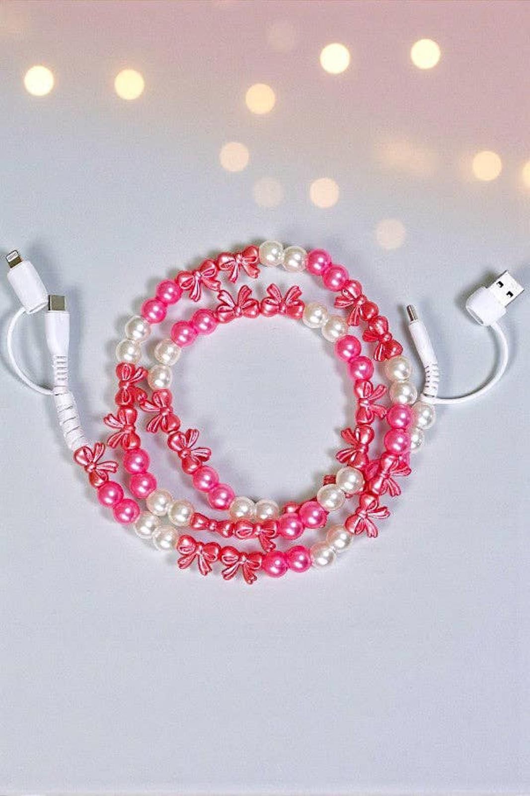Other Updated Pearl and Bow Beaded Phone Charger Size ONE SIZE - 1 Preview