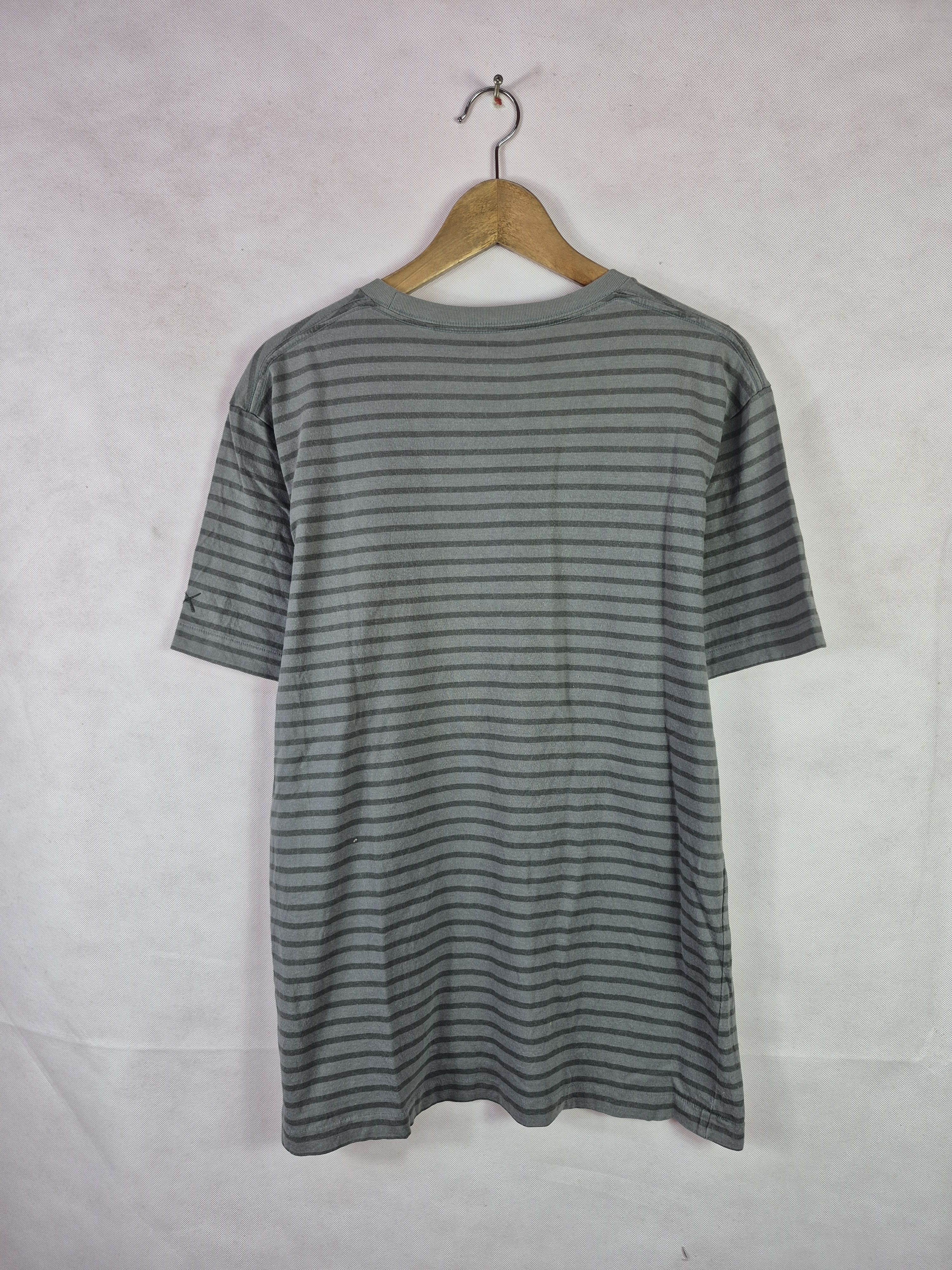 Japanese Brand 🔥 Uniqlo Kaws Stripes Mini Embroidery Tee Streetwear Skate Size US L / EU 52-54 / 3 - 5 Thumbnail