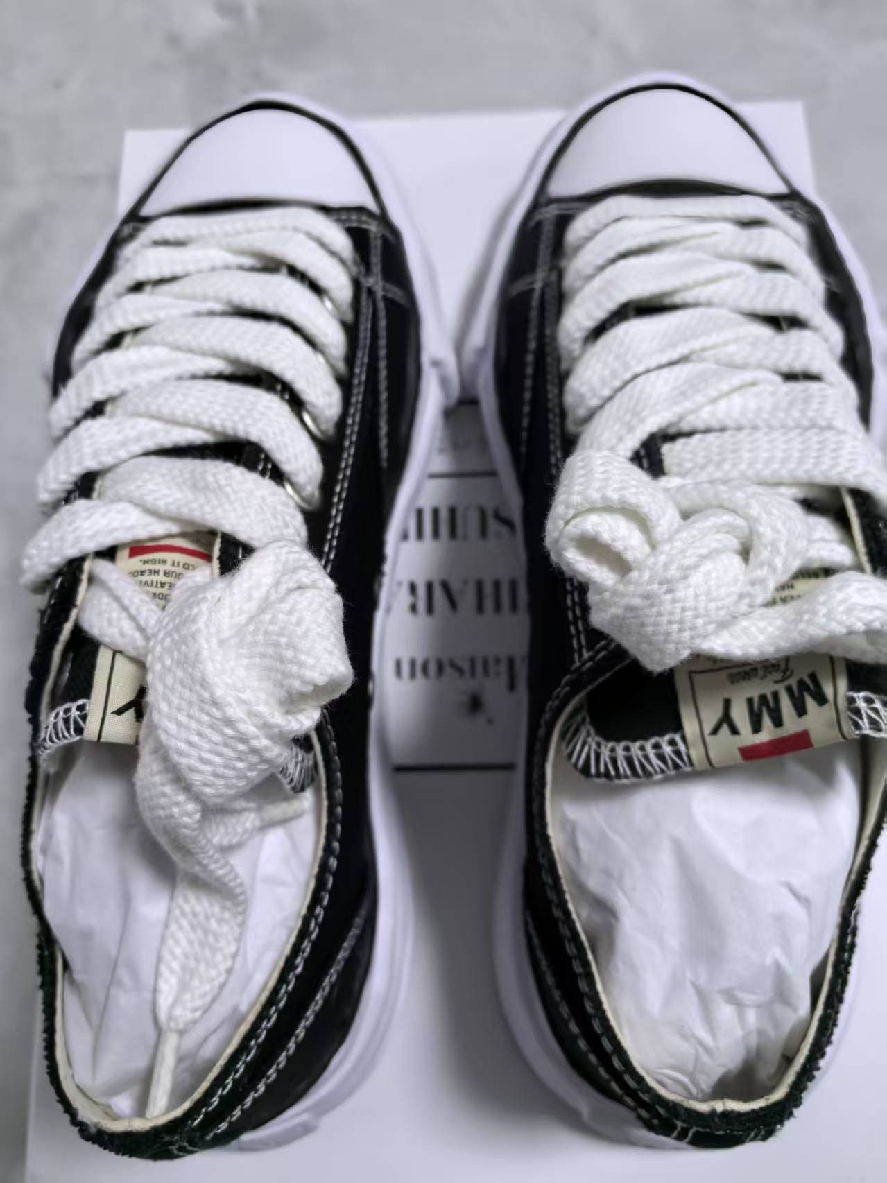Maison Mihara black low-top sneakers