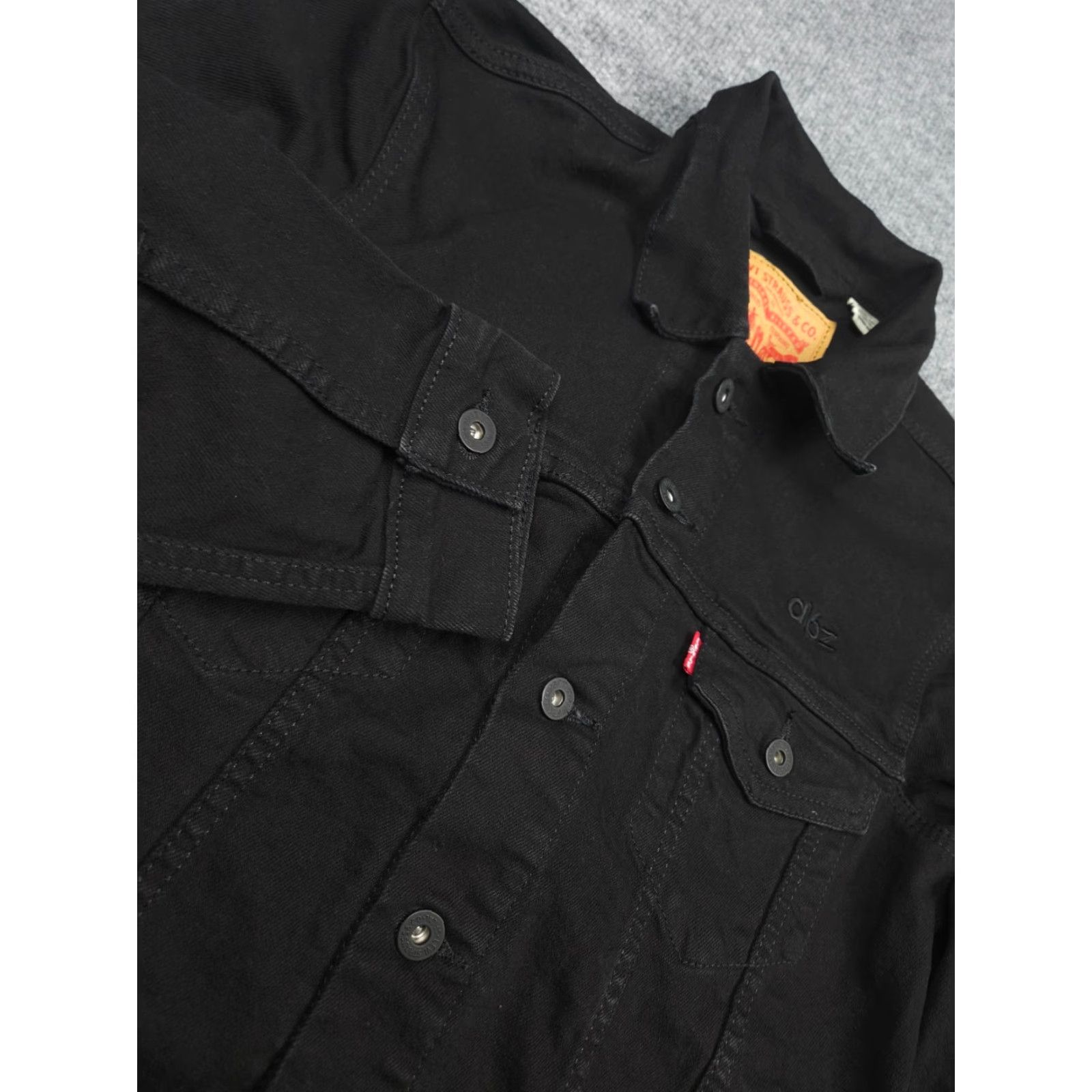 Levi's **Levi's Men's XS Black Embroidered Trucker Jacket** User: Levi's Men's XS Black Embroidered Trucker Jacket Size US XS / EU 42 / 0 - 4 Thumbnail