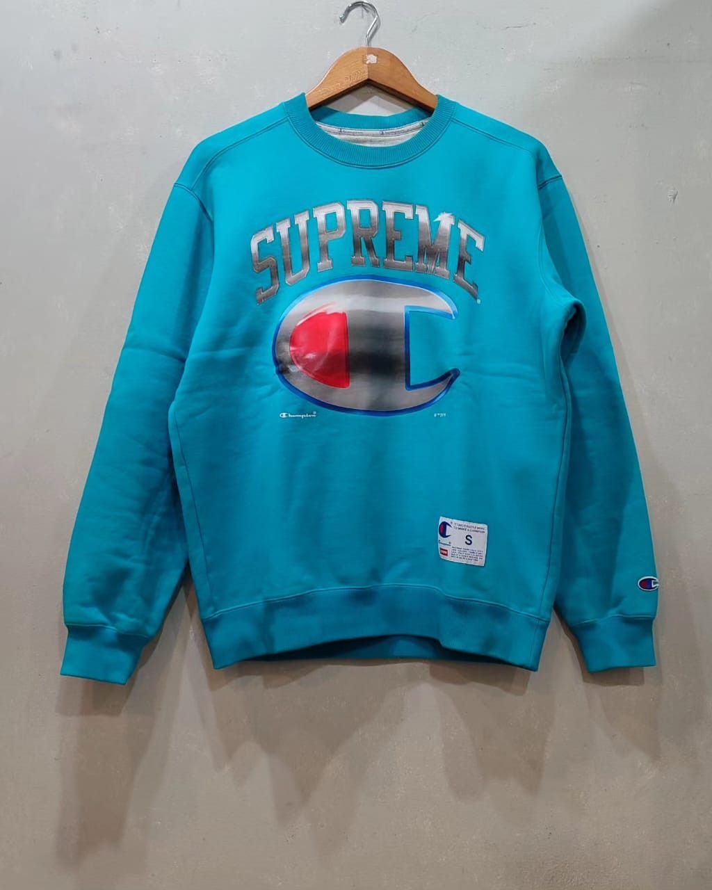 Supreme Champion Chrome Crewneck (SS19) - $148