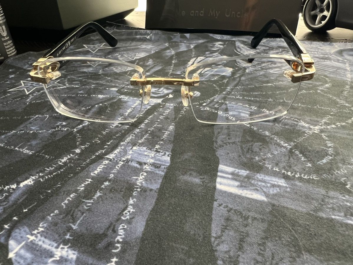image of Cartier Rimless Glasses in Black, Men's