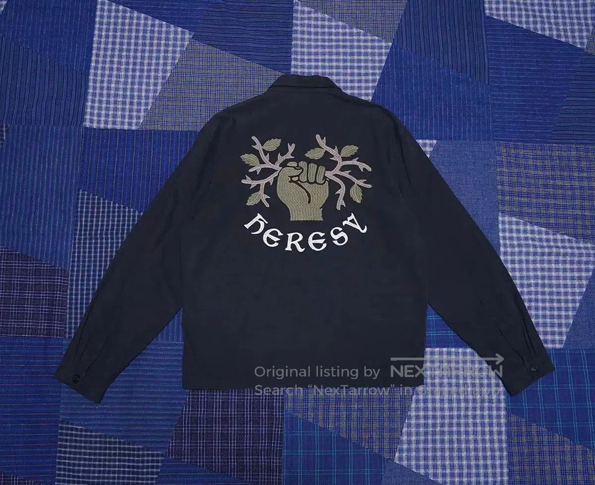 heresy guild navy shirt with logo embroidery.