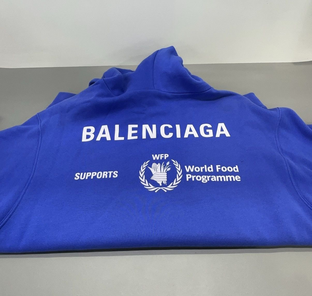 Balenciaga Balenciaga World Food Programme logo-print cotton hoodie Size US XS / EU 42 / 0 - 9 Thumbnail