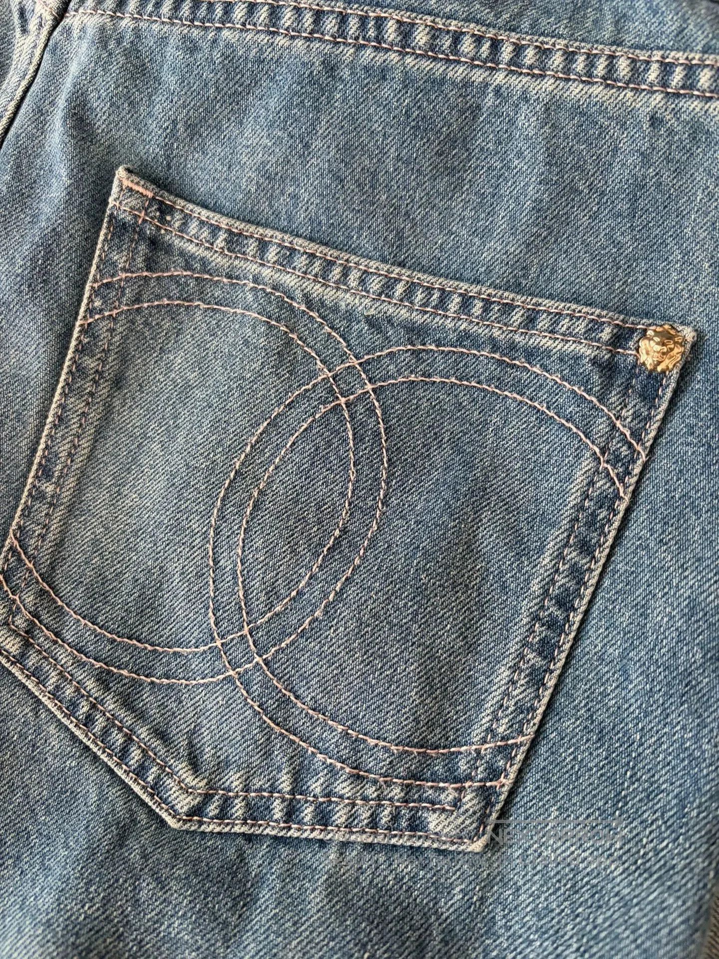 Chanel 25A Wide-Leg Denim Jeans.