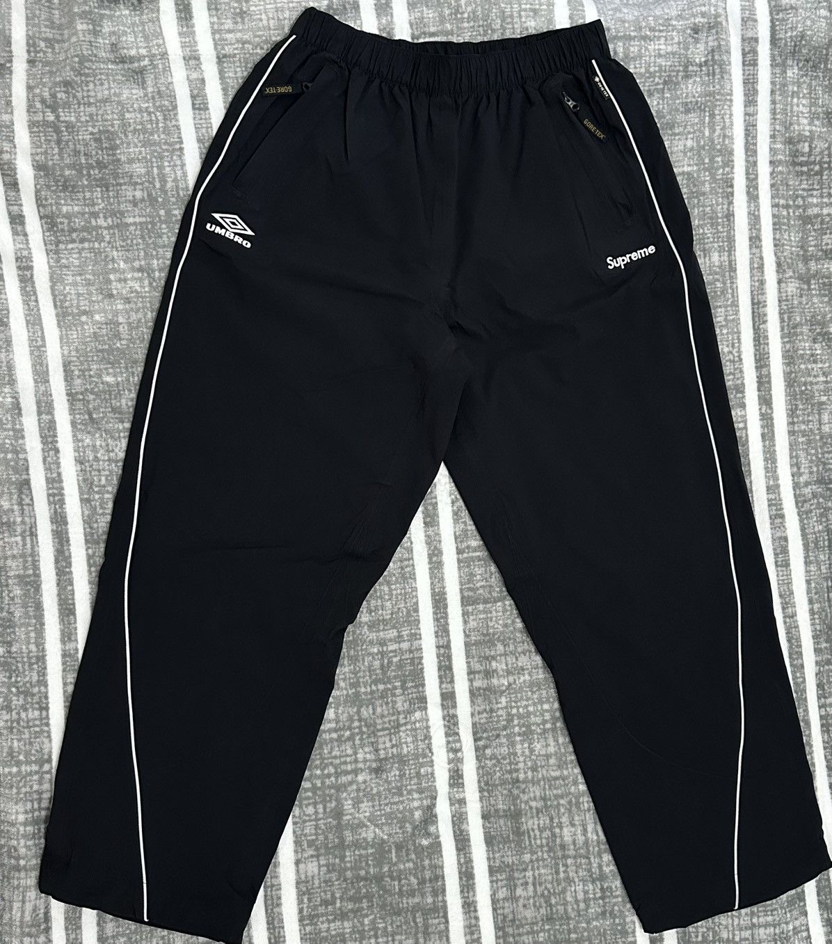 Supreme Umbro Track Pants Black Supreme Umbro Track Pant (SS23) $158