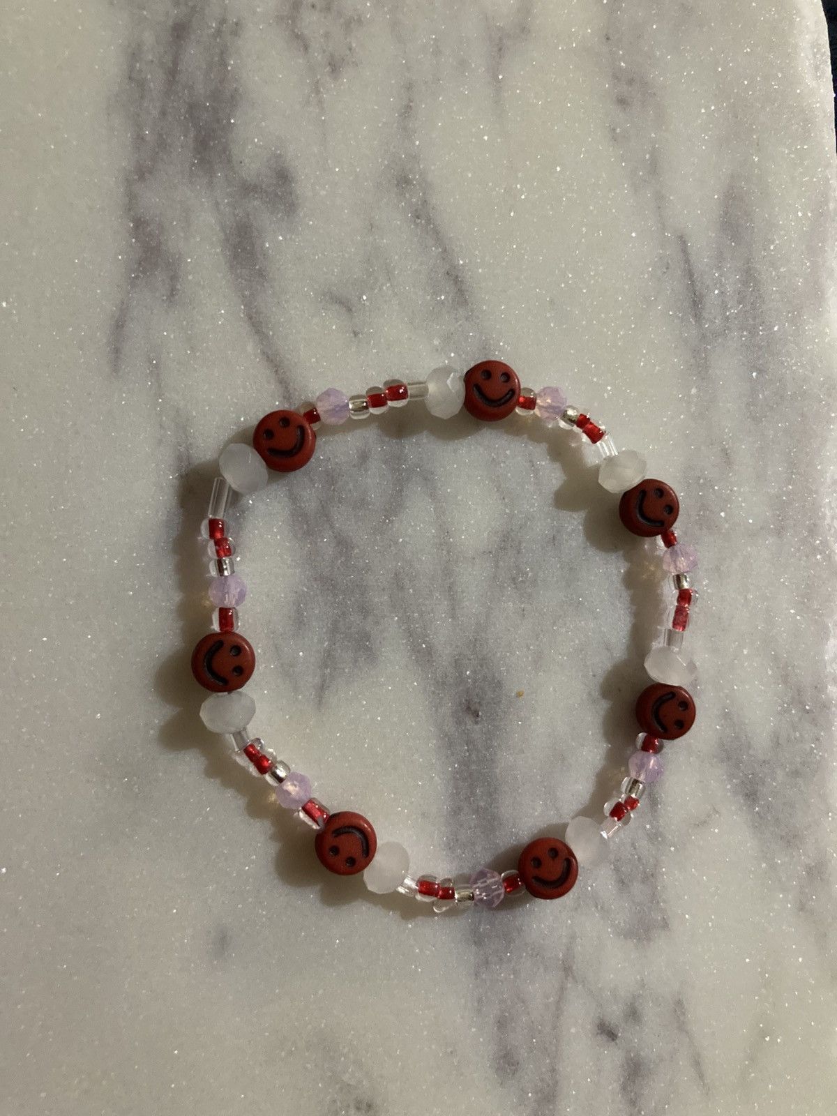 Other Red smiley faced beaded bracelet Size ONE SIZE - 1 Preview