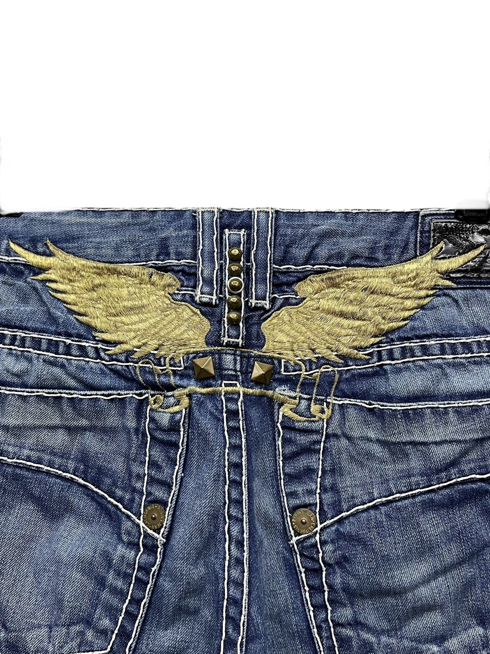 RARE hotsell Vintage Robins Jeans Black and Gold Wings