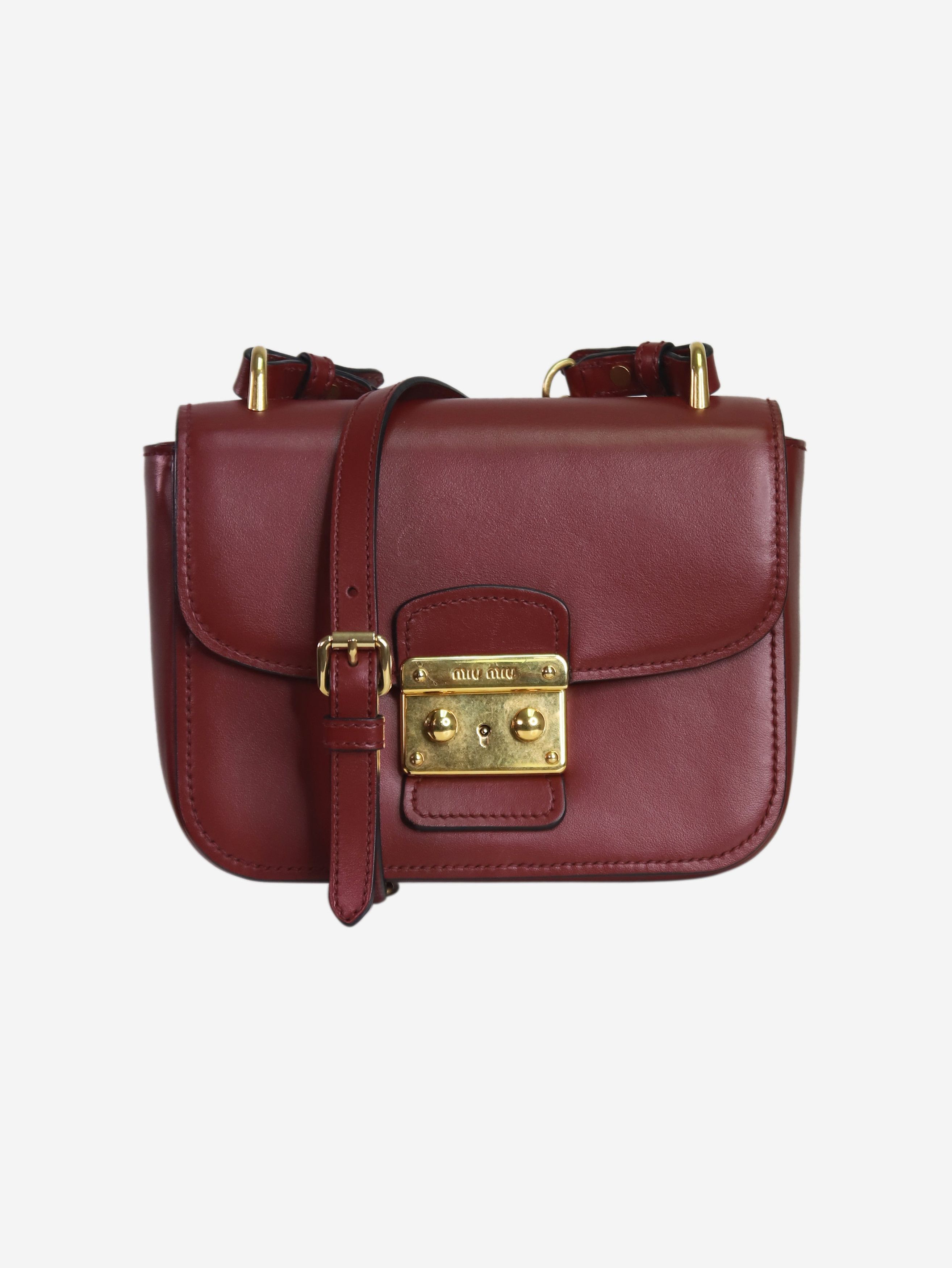 Burgundy flap closure leather cross-body bag