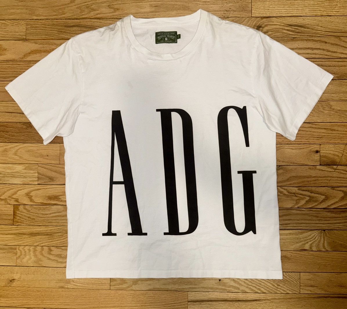 DENIM TEARS 🖤Denim Tears🖤 ADG Inc. Tee (White) Size US XL / EU 56 / 4 - 1 Thumbnail