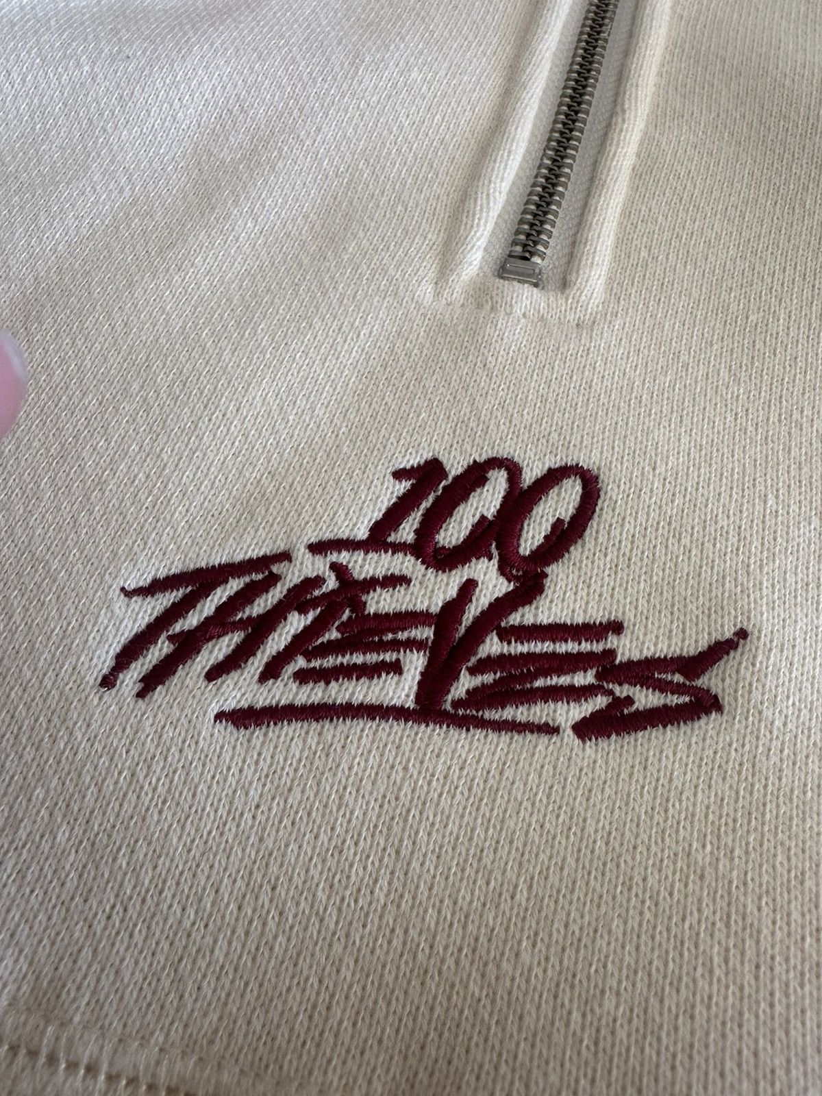 100 Thieves 100 Thieves Quarter Zip — Cream w/ Maroon Logo (L) Size US L / EU 52-54 / 3 - 4 Thumbnail