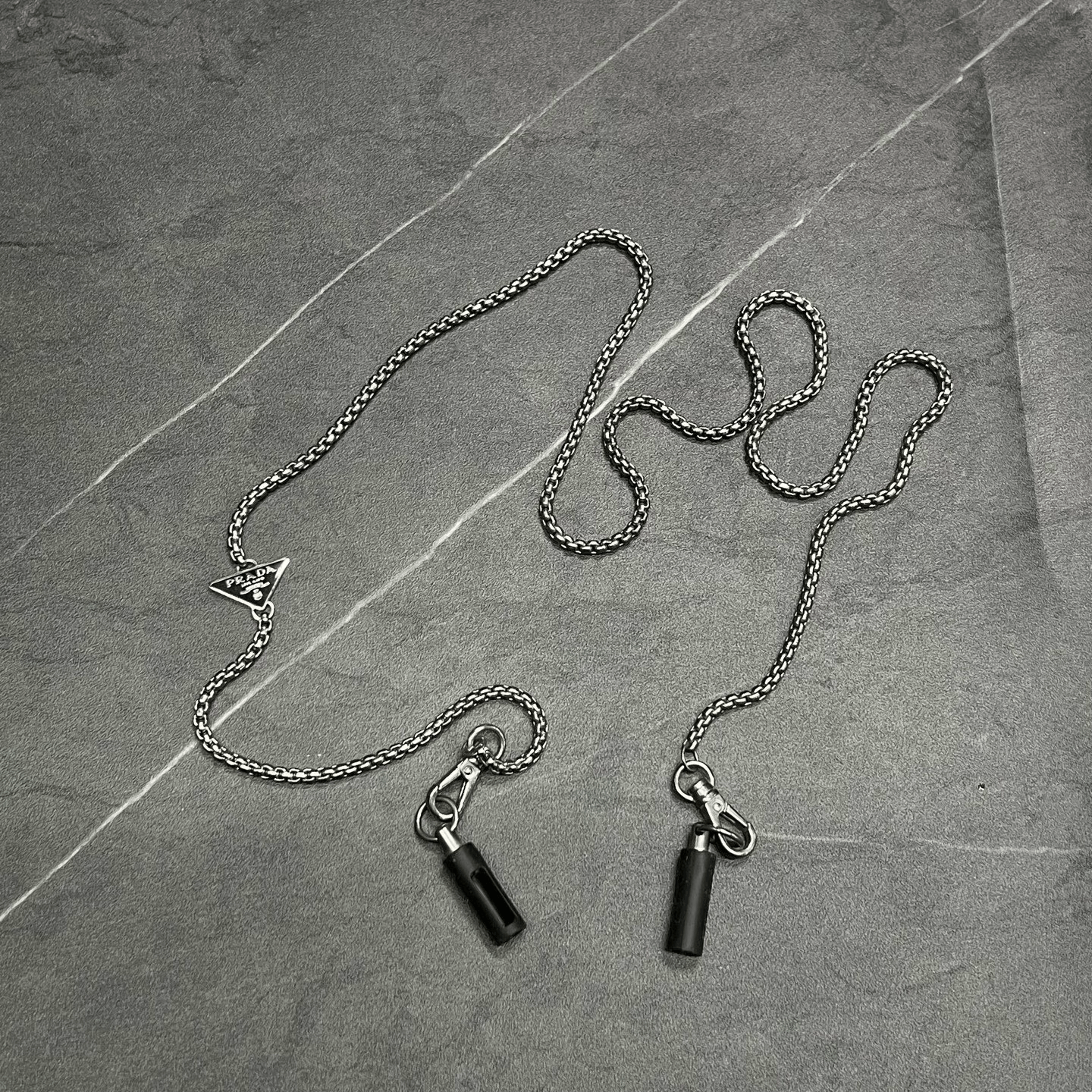 Prada Prada Metal Triangle Logo Headphone Chain Size ONE SIZE - 1 Thumbnail