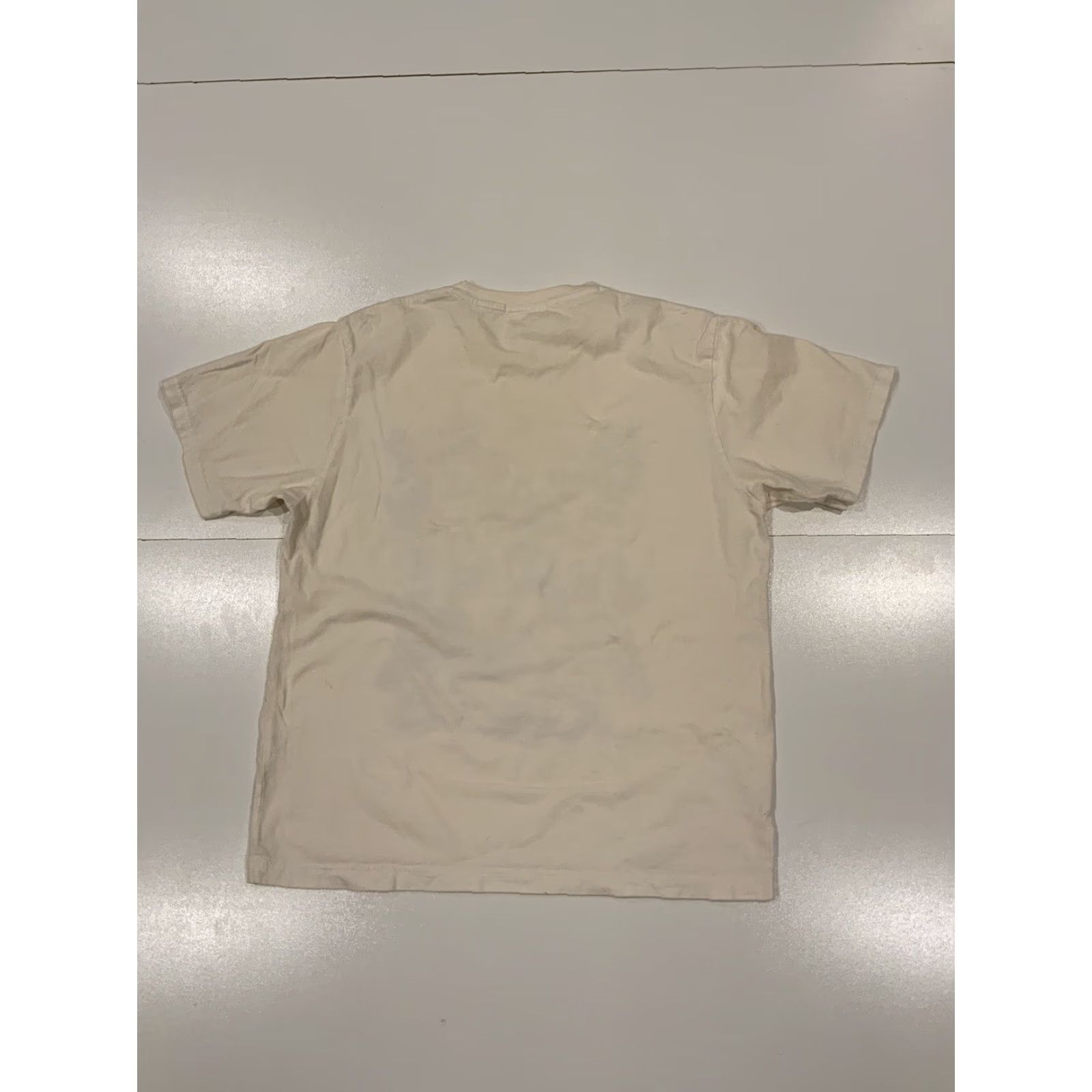 Uniqlo **UT Uniqlo Monsters Characters Crowd Scene Graphic White T-Shirt XL** User: **UT Uniqlo Monsters Characters Crowd Scene Graphic White T-Shirt XL** Size US XL / EU 56 / 4 - 2 Thumbnail