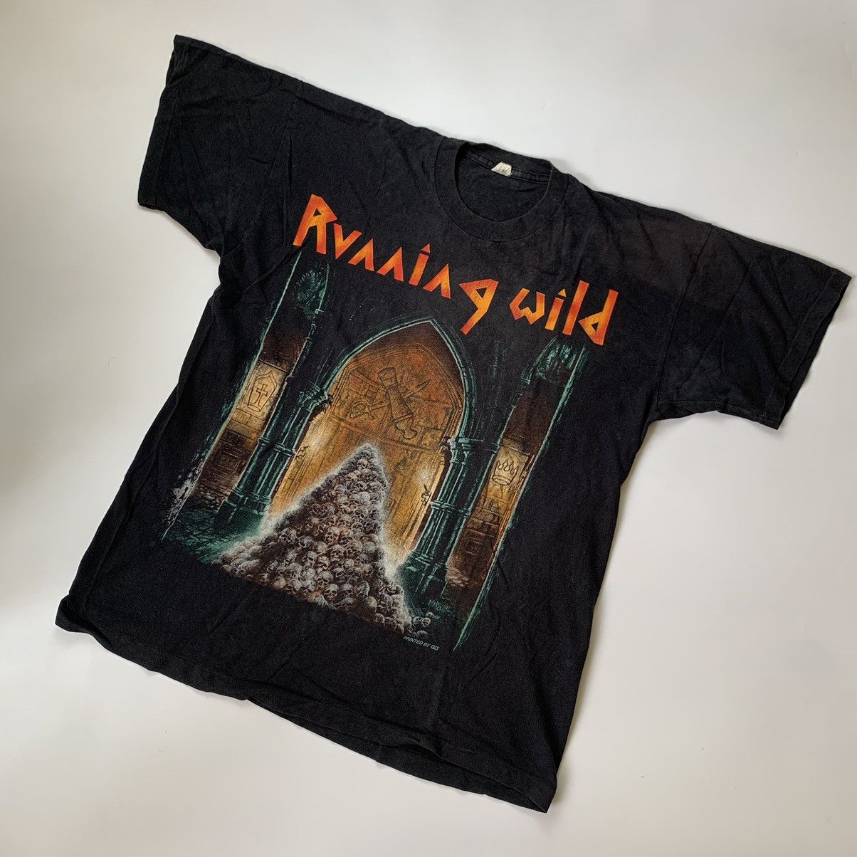 image of Band Tees x Metallica Running Wild 1993 Pile Of Skulls Vintage Band T-Shirt in Black (Size XL)