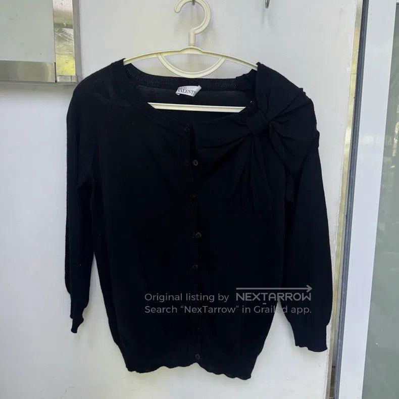 Valentino Knitted sweater over wool coat