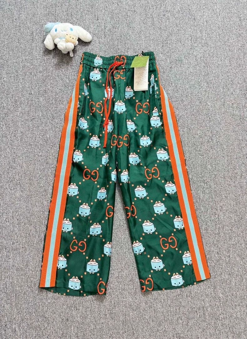 Gucci Gucci SizeXXS Green cartoon GG full logo trousers Size US 29 - 1 Thumbnail