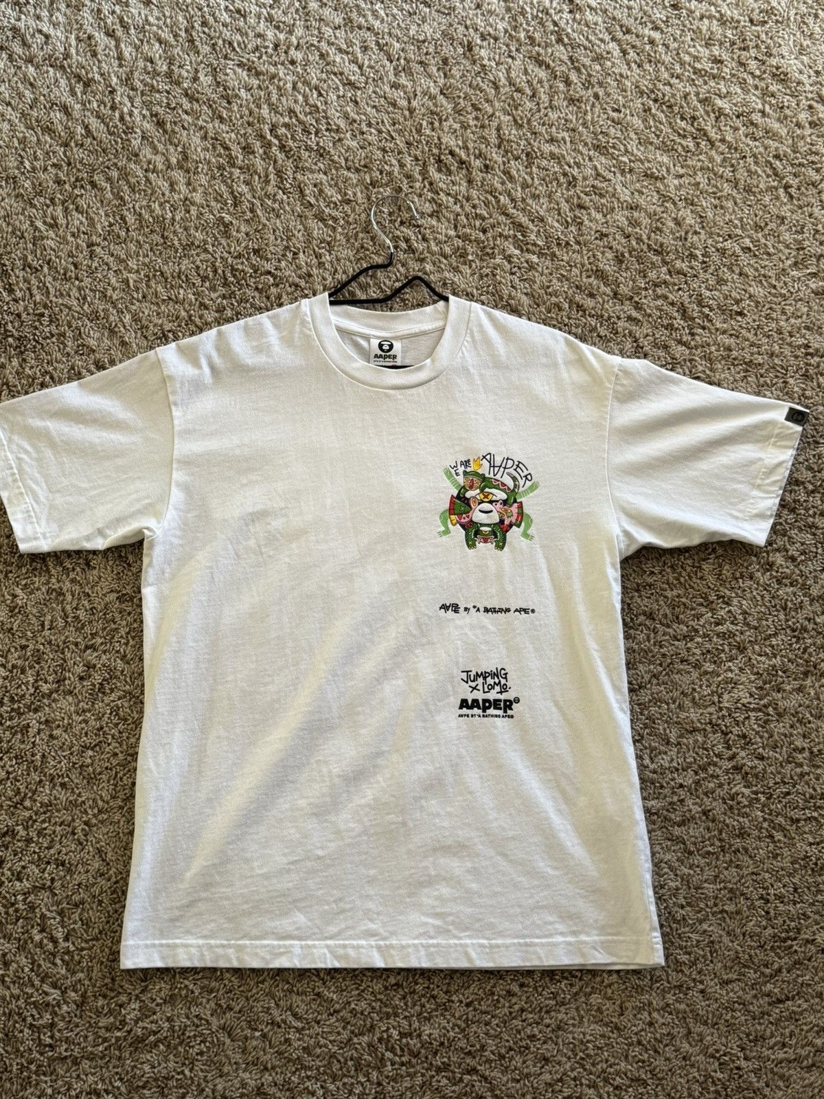 image of Aape X Jumping Lomo Graphic Tee in White, Men's (Size Medium)
