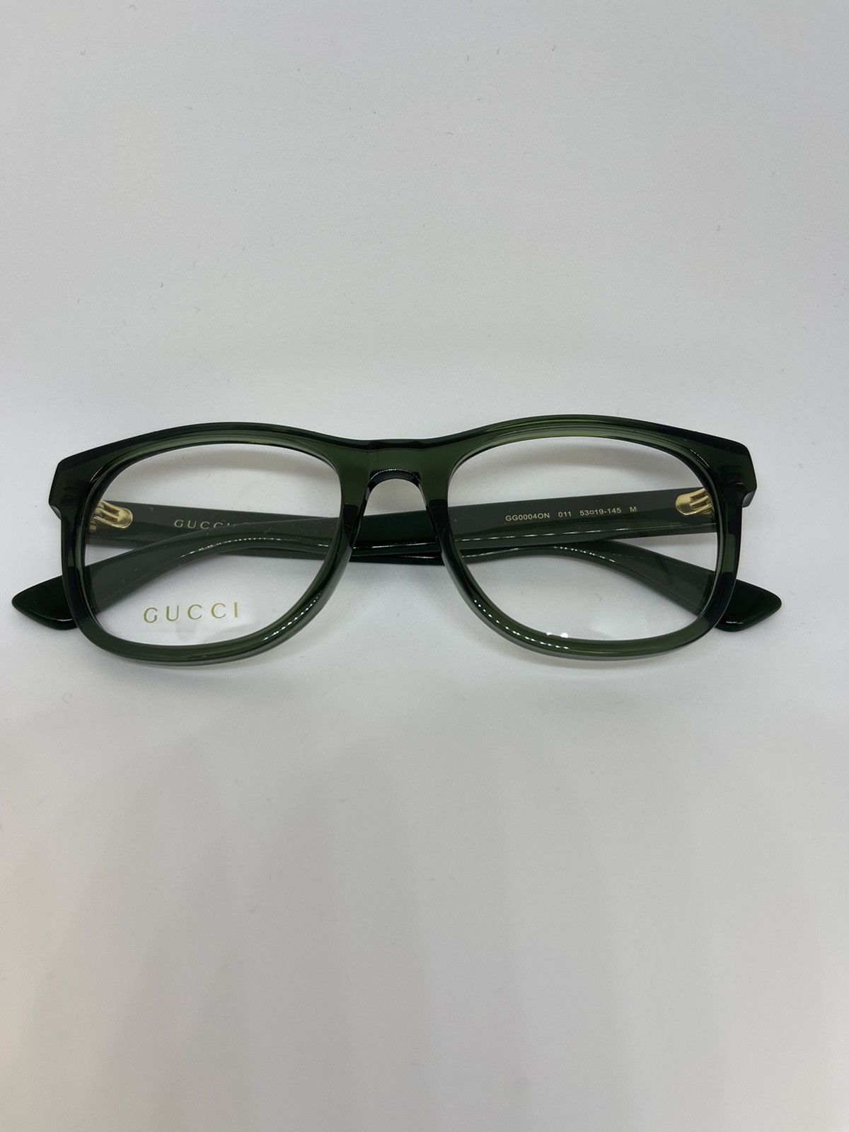 image of Gucci Glasses in Green, Men's