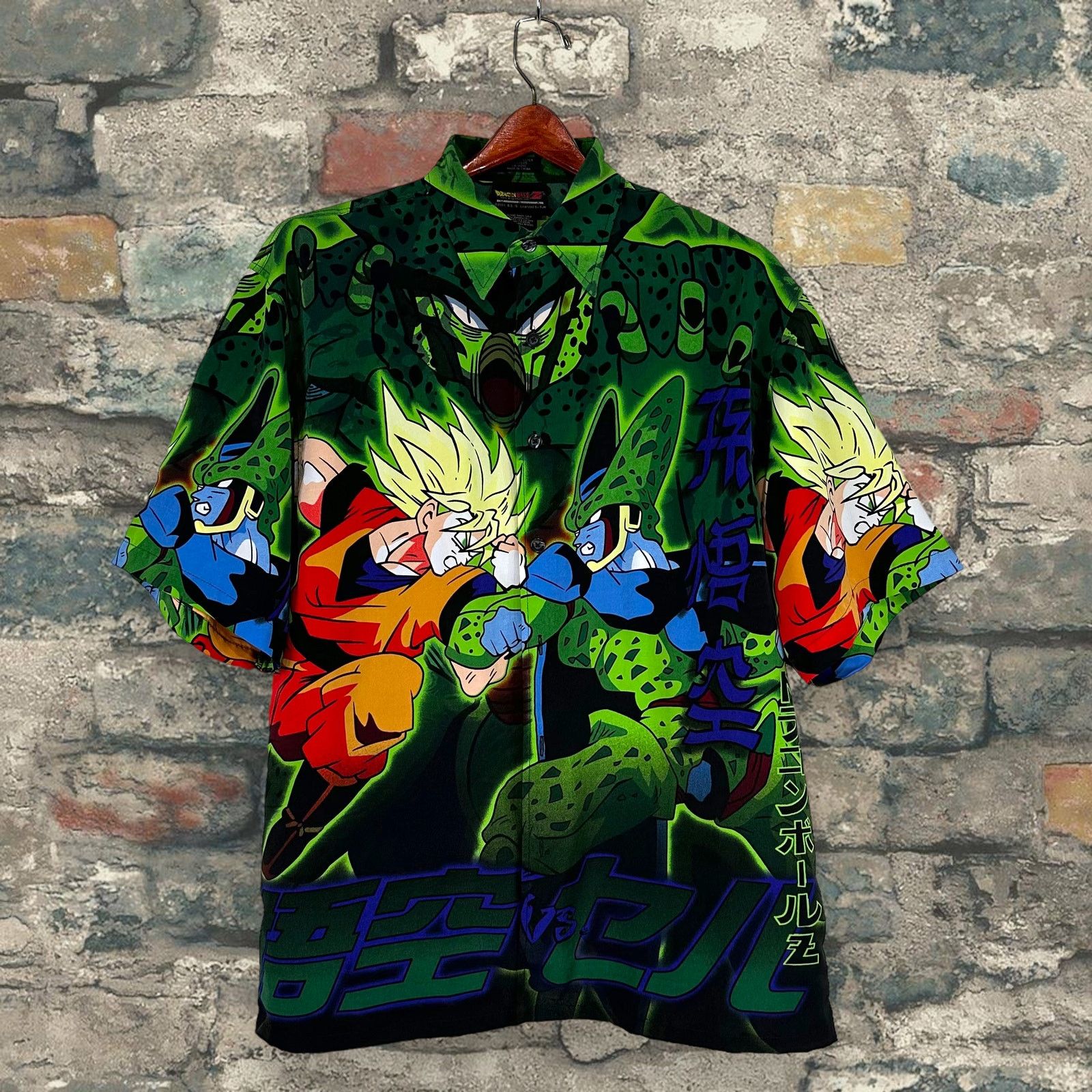 Image of Vintage Dragon Ball Z Button Up Casual Shirt Cell Goku Y2K in Black, Men's (Size Large)