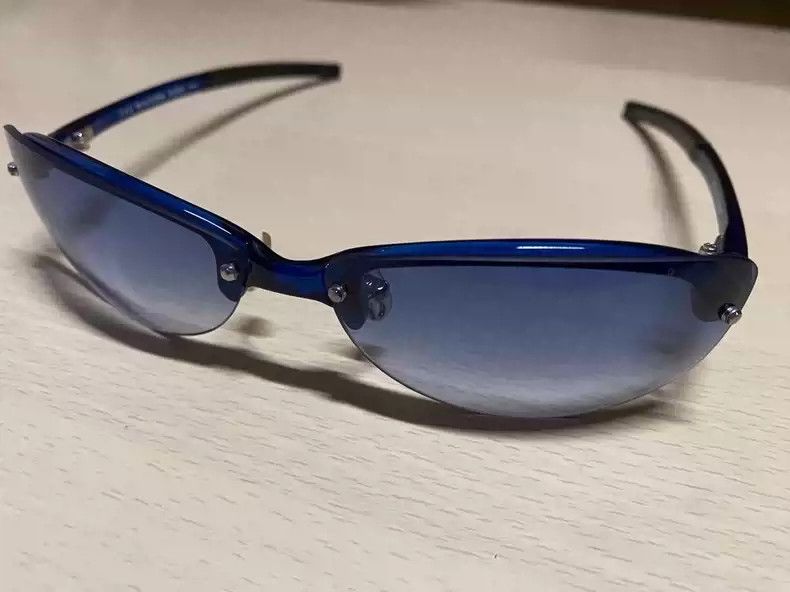 Jean Paul Gaultier Blue sunglasses.