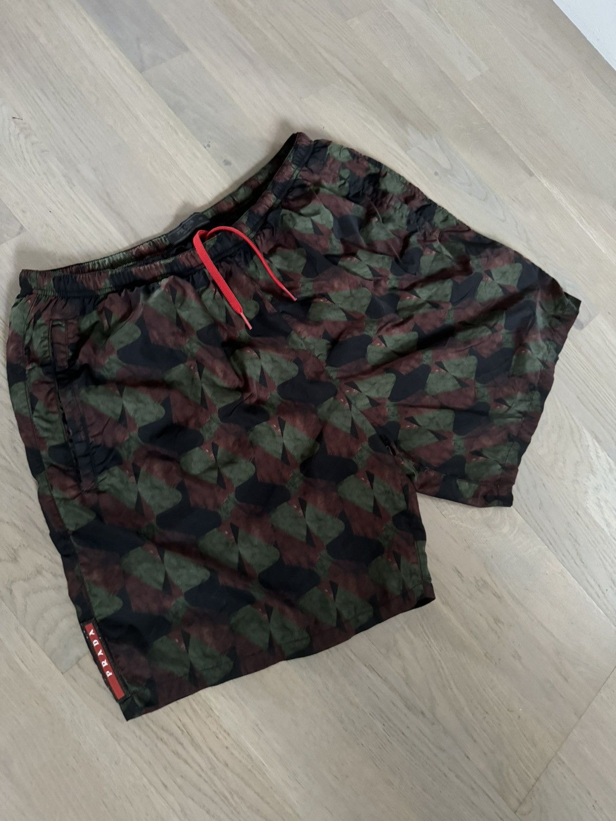 Prada PRADA swim shorts REAL sizes in PHOTOS BY TAPE MEASURE | Grailed