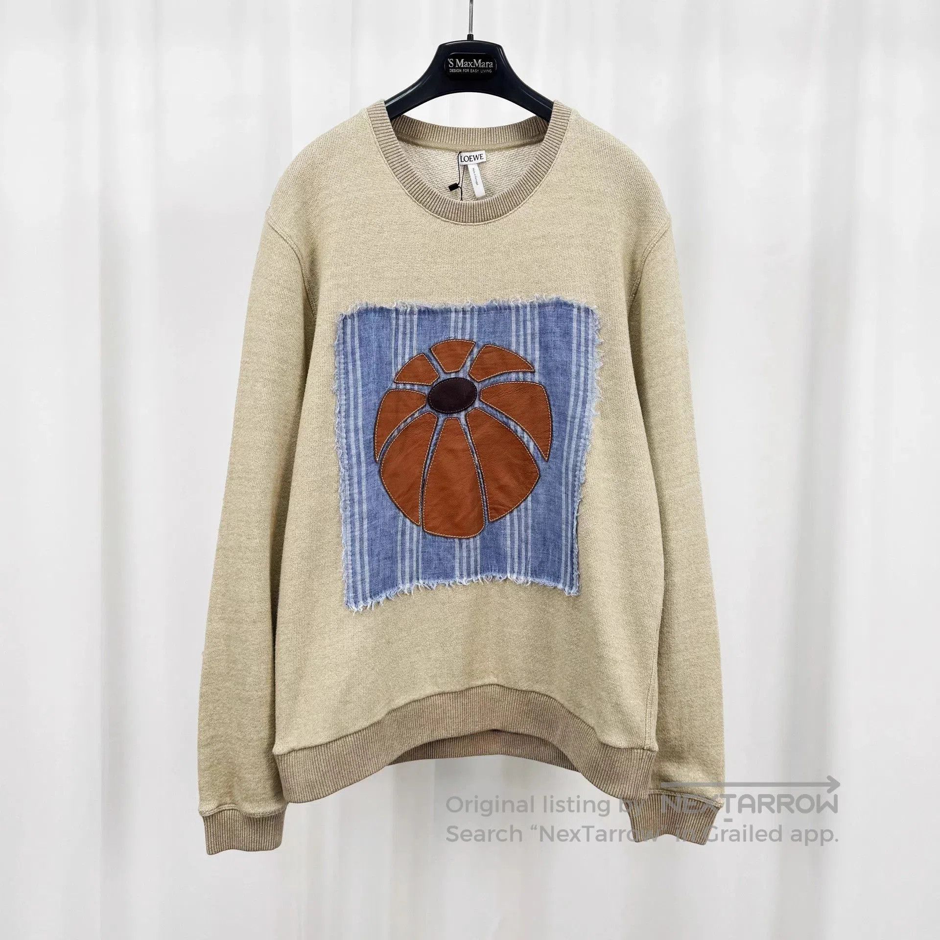 Beige Sweatshirt with Floral Patch Design - Size M.