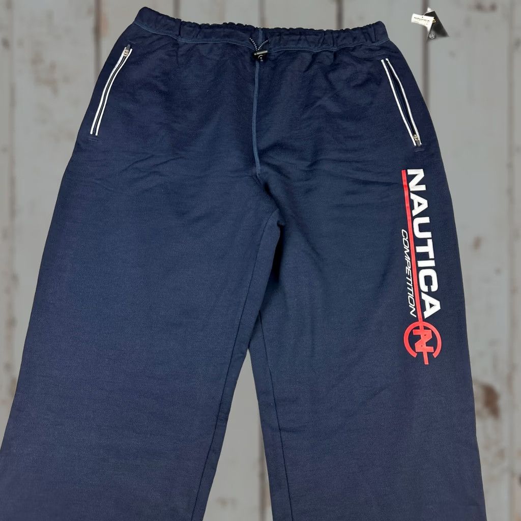 Nautica Nautica Competition Pants Men XL Blue Windbreaker Style Reflective Pockets Nylon Polyester Cotton Athletic Slim Straight Inseam 33 in Vintage Y2K Logo Size US 36 / EU 52 - 1 Thumbnail