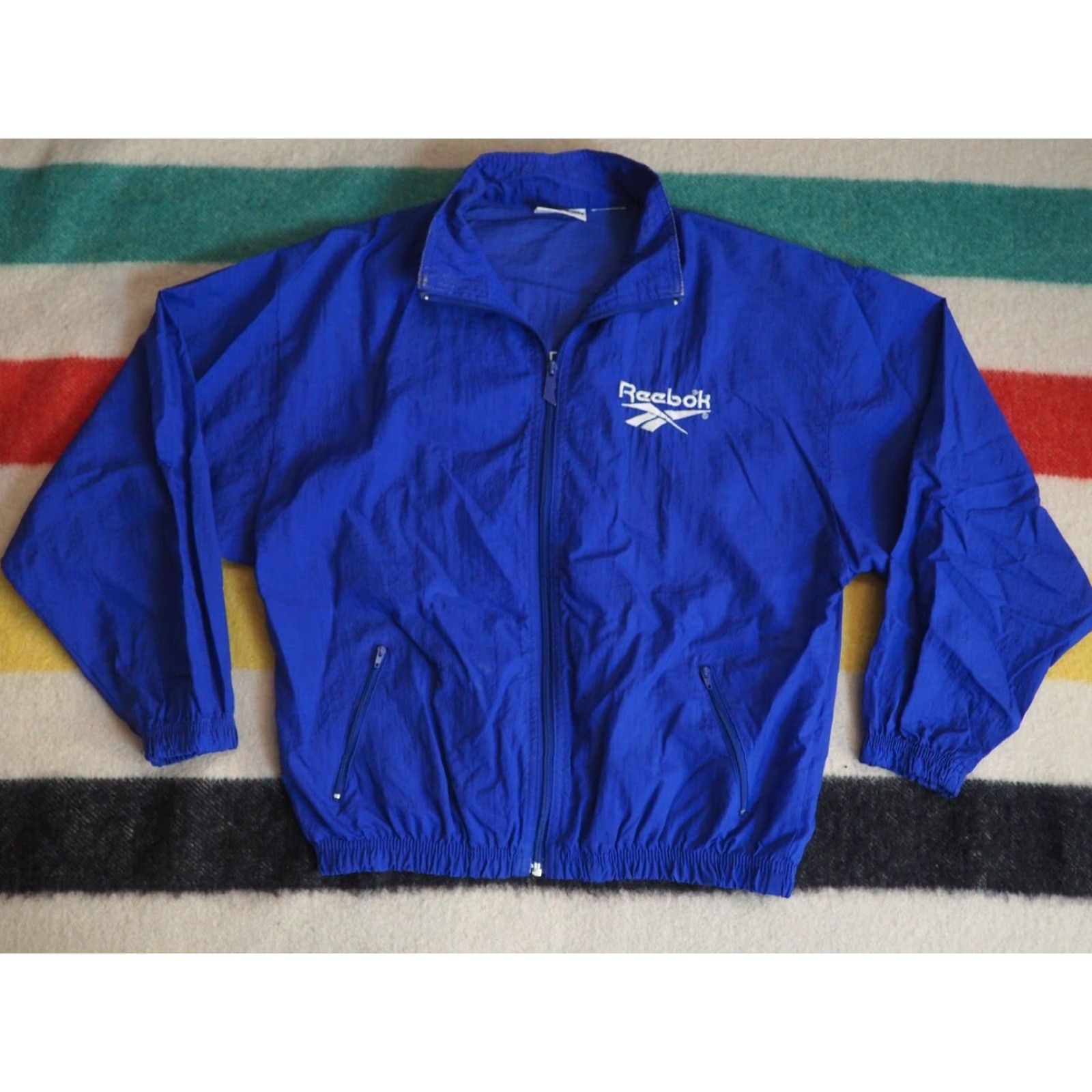 Reebok VTG Reebok Track Jacket Windbreaker Royal Blue Logo Zip Short Sleeve Womens L Blue 80s 90s Athletic Running Jogging Pockets Vintage Size L / US 10 / IT 46 - 2 Thumbnail