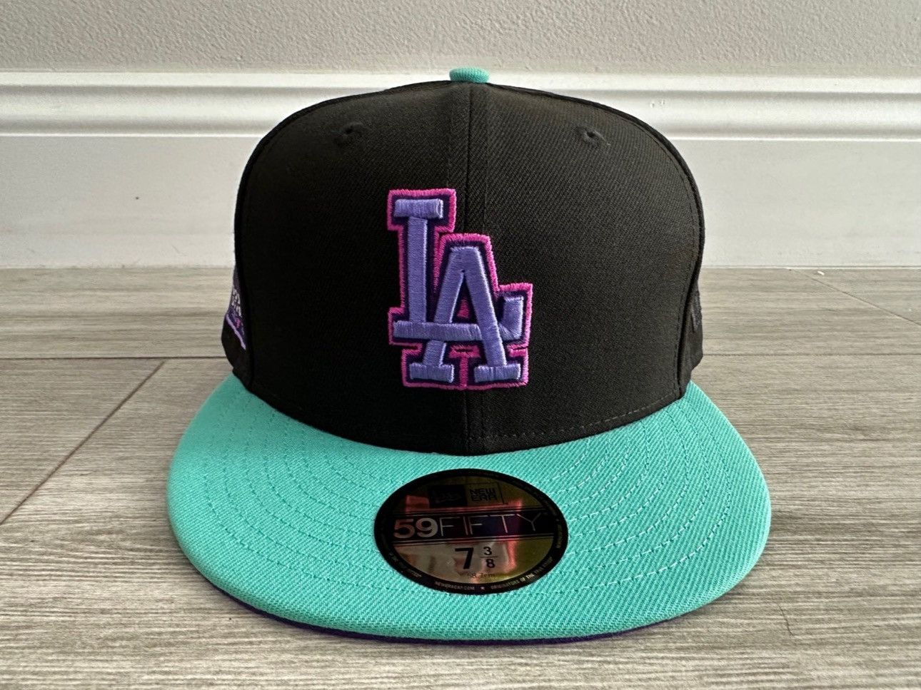 image of La Los Angeles Dodgers Lids New Era Cosmic Dust Fitted 7 3/8 in Black, Men's