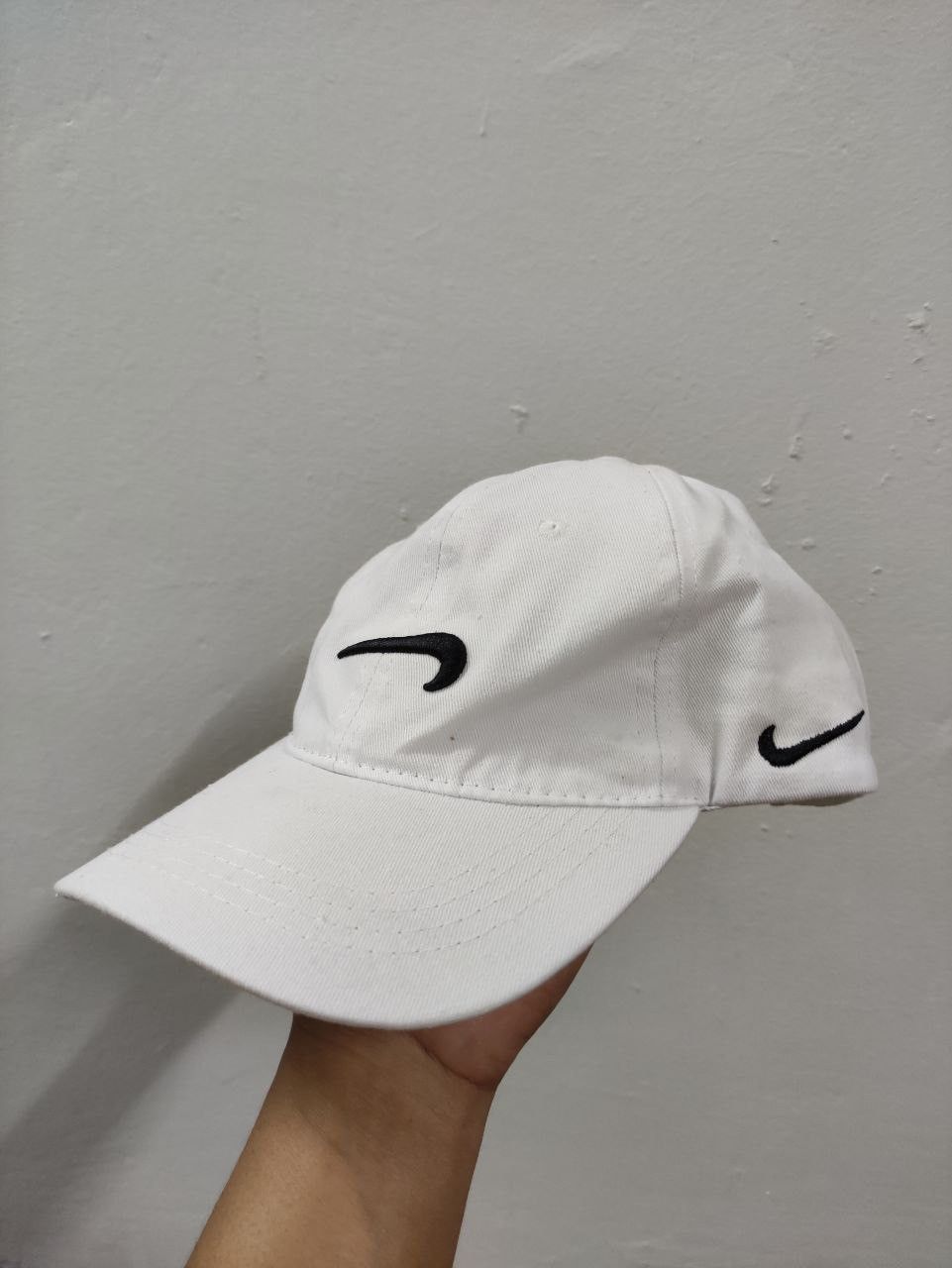 backwards swoosh nike