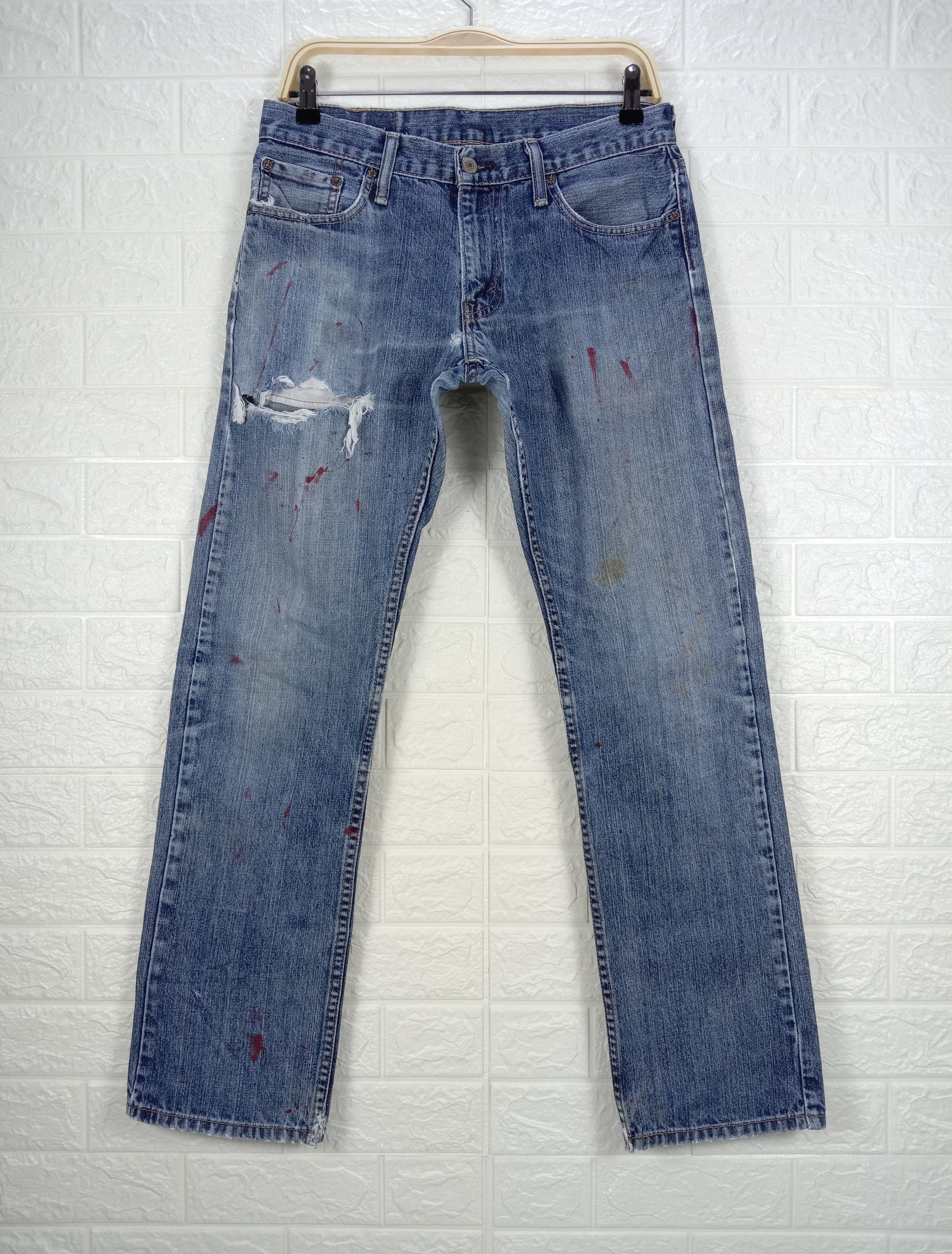 image of Vintage Levi's 514 Paint Splatter Jeans Distressed Denim in Blue, Men's (Size 30)