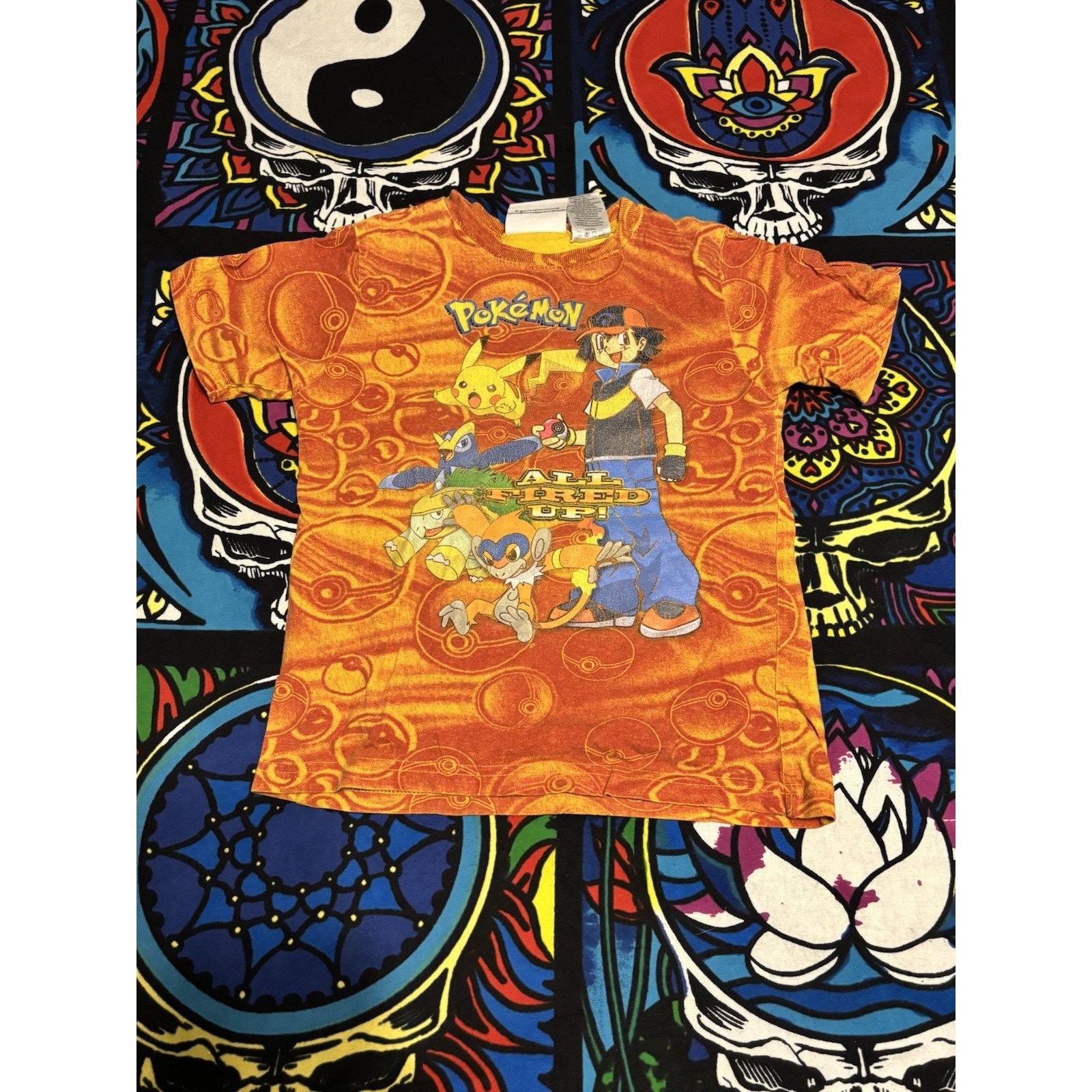 Vintage vintage pokemon orange anime t-shirt aop pokeballs Sz youth Size US S / EU 44-46 / 1 - 1 Thumbnail