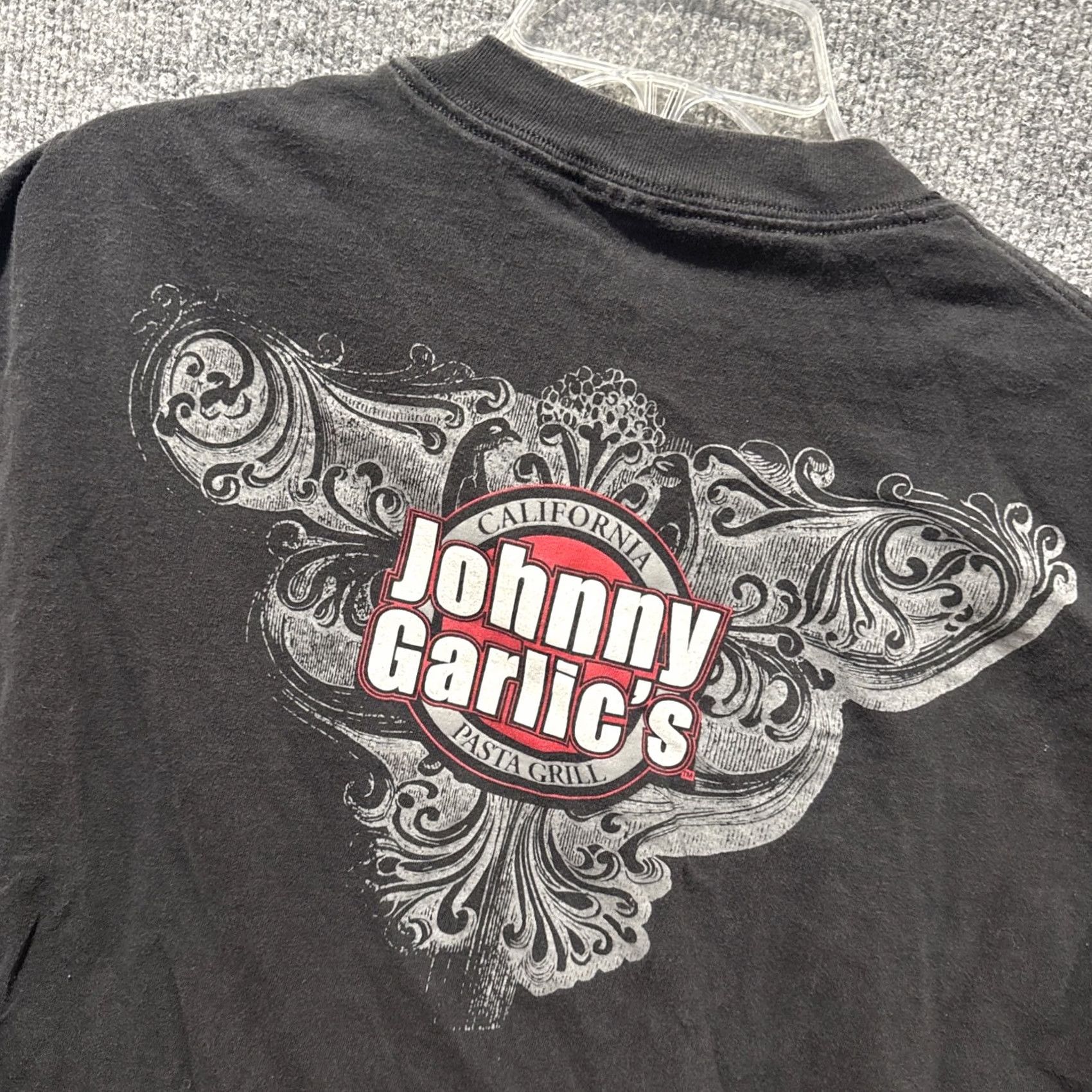 Hanes VINTAGE Johnny Garlic’s California Pasta Grill Grunge Y2K Black Short Sleeve T-Shirt XL Mens Hanes XL Black Grunge Y2K T-Shirt Size US XL / EU 56 / 4 - 7 Thumbnail