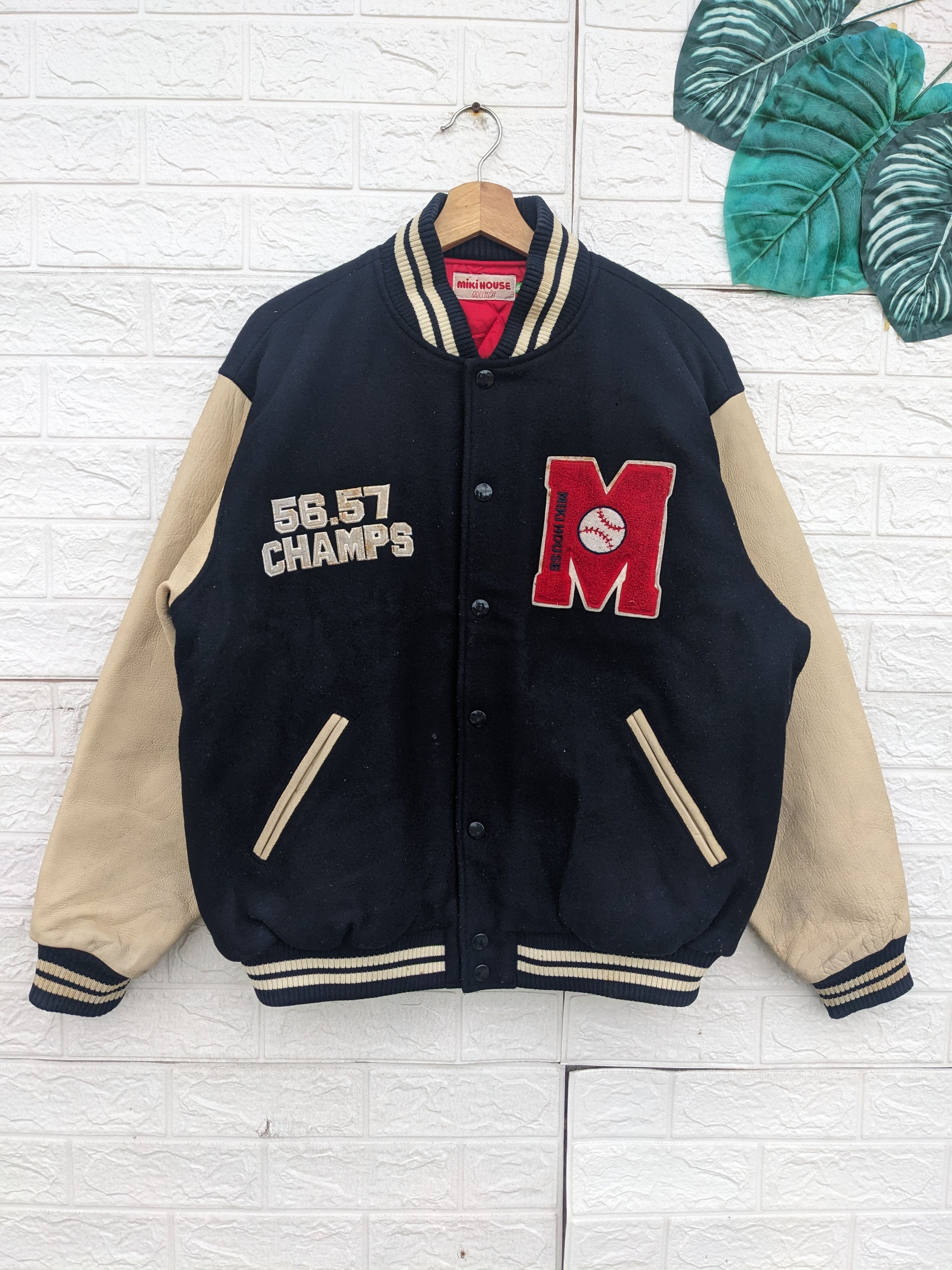 image of Vintage Disney Miki House Leather Sleeve Varsity Jacket in Dark Blue, Men's (Size Large)