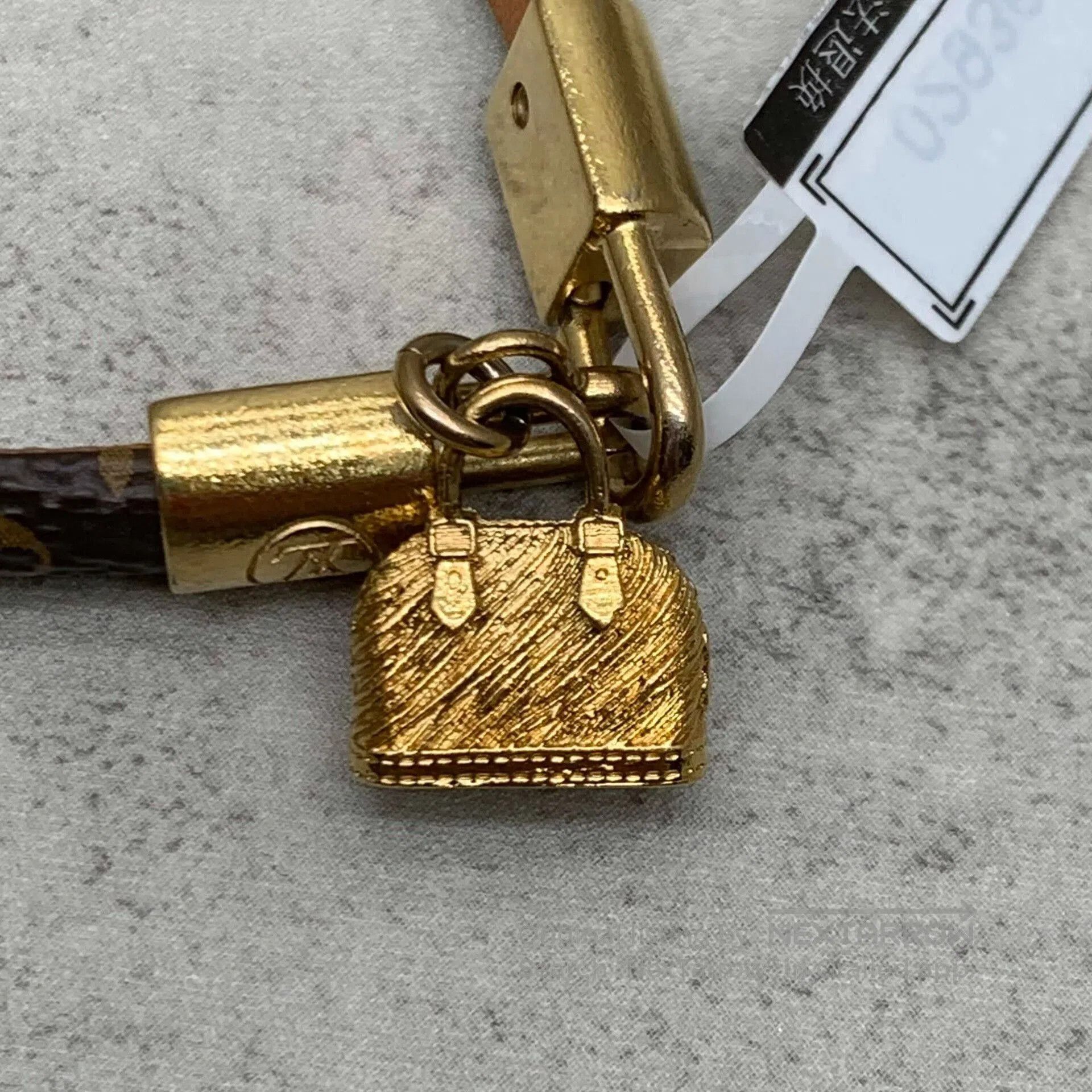 Louis Vuitton lv brown monogram bracelet with gold clasp. Size ONE SIZE - 9 Thumbnail