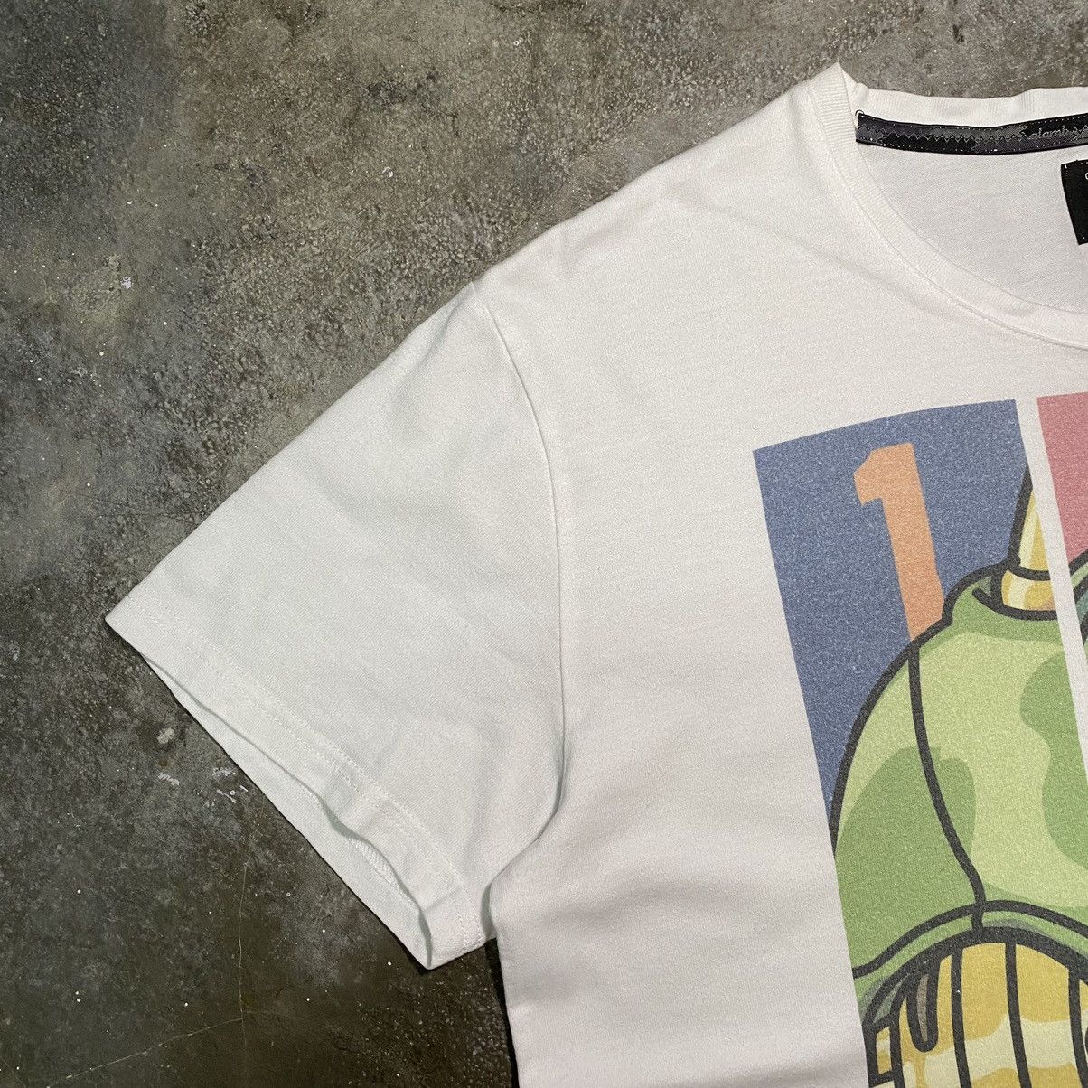 Anime JOJO x GLAMB ECHOES ACT 1 ACT 2 & ACT 3 STAND ANIME T SHIRT Size US L / EU 52-54 / 3 - 4 Thumbnail