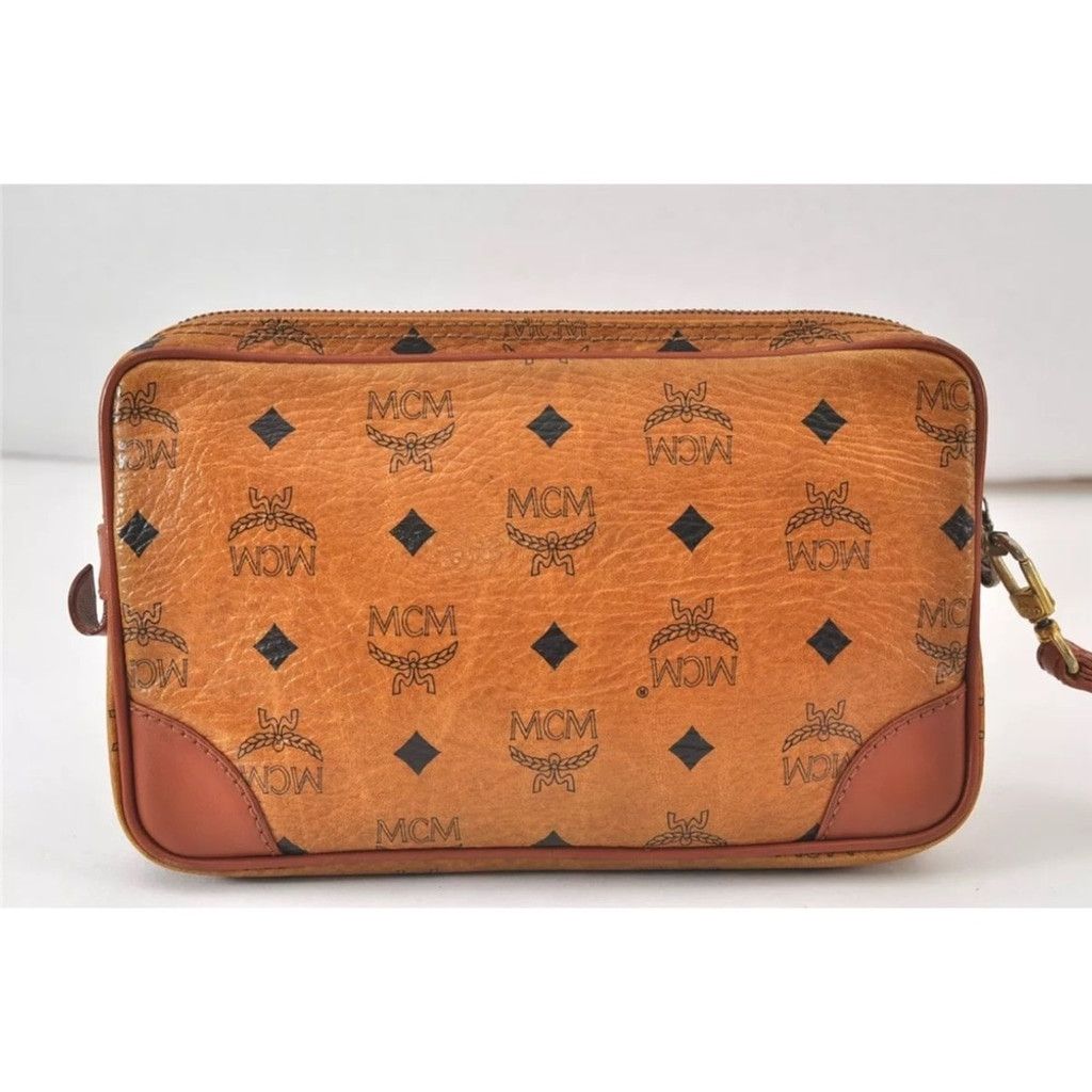 MCM MCM Brown Clutch with Logo Pattern and Wrist Strap Size ONE SIZE - 2 Thumbnail