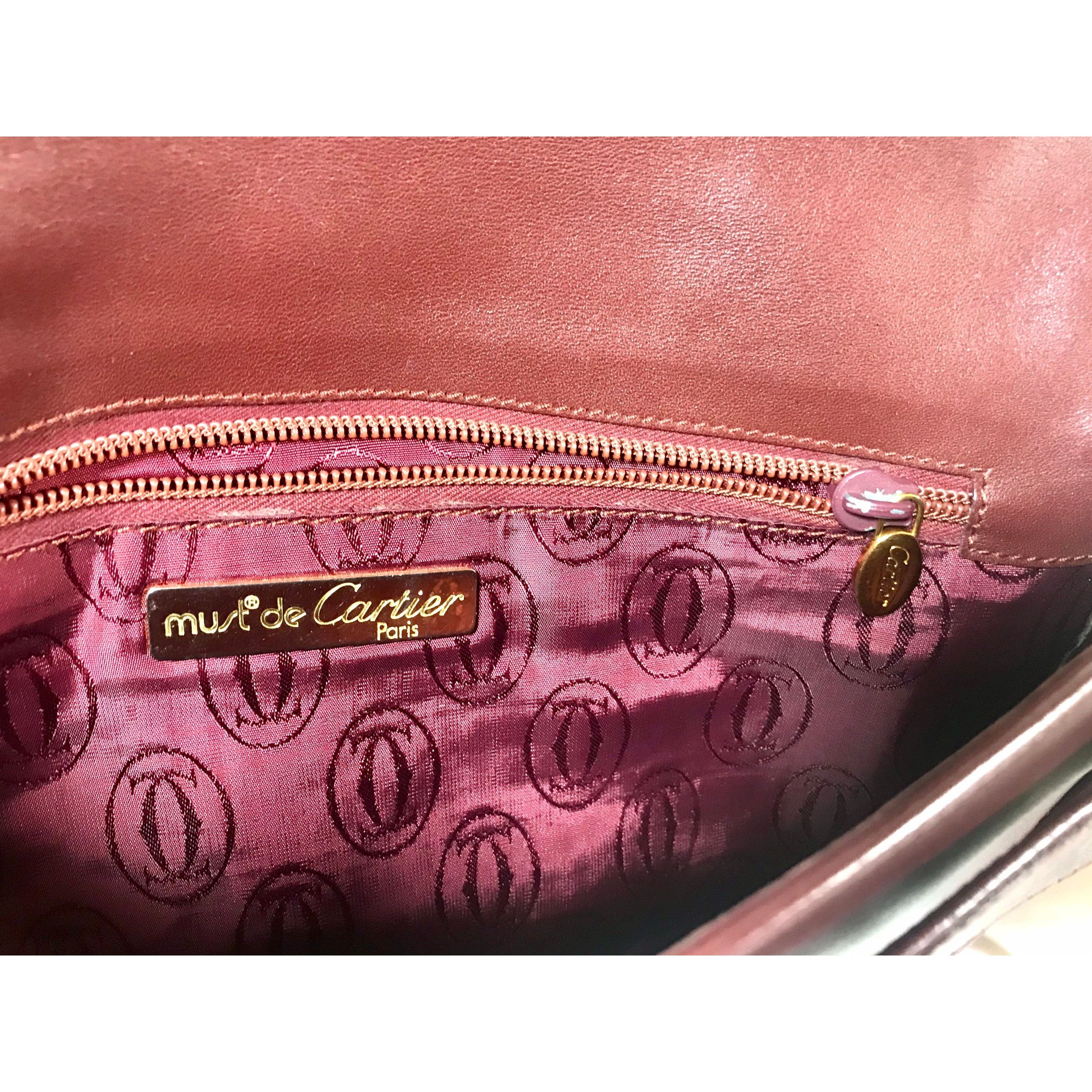 Cartier Vintage Cartier wine leather clutch bag with gold tone logo Size ONE SIZE - 7 Thumbnail